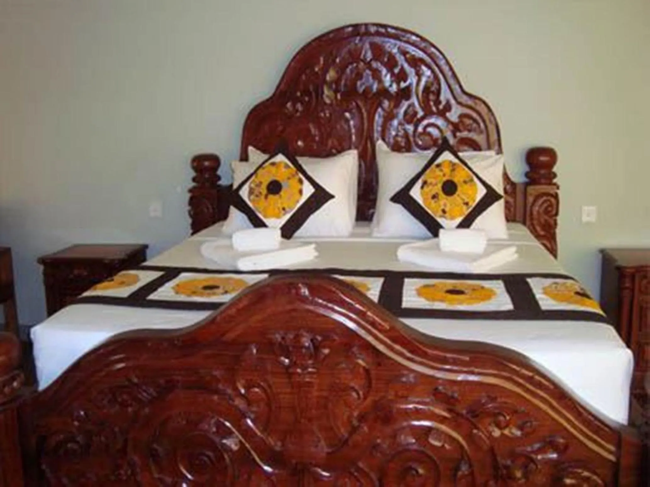 Bed in Memoria Palace & Resort