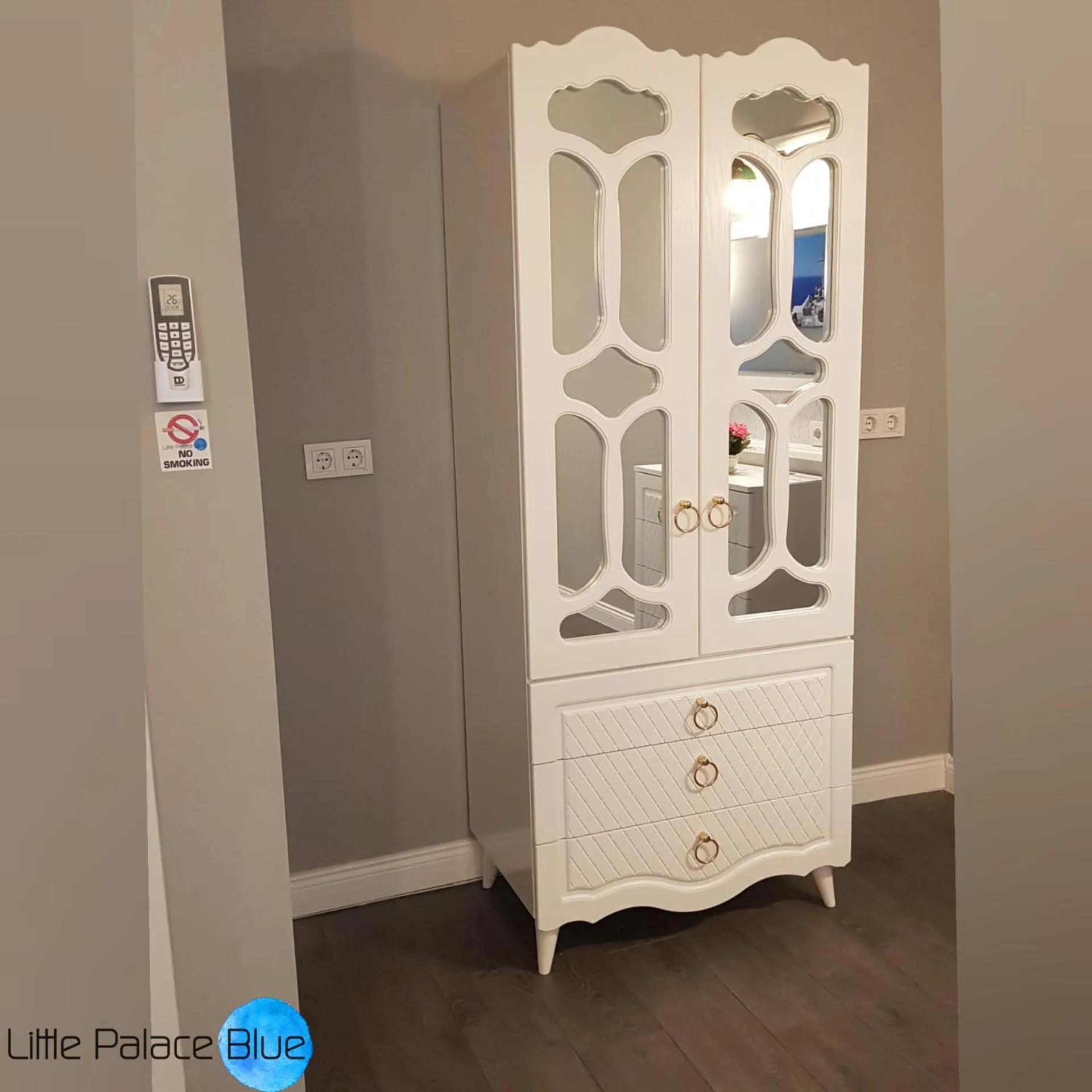 Bed in Little Palace Blue Apartment