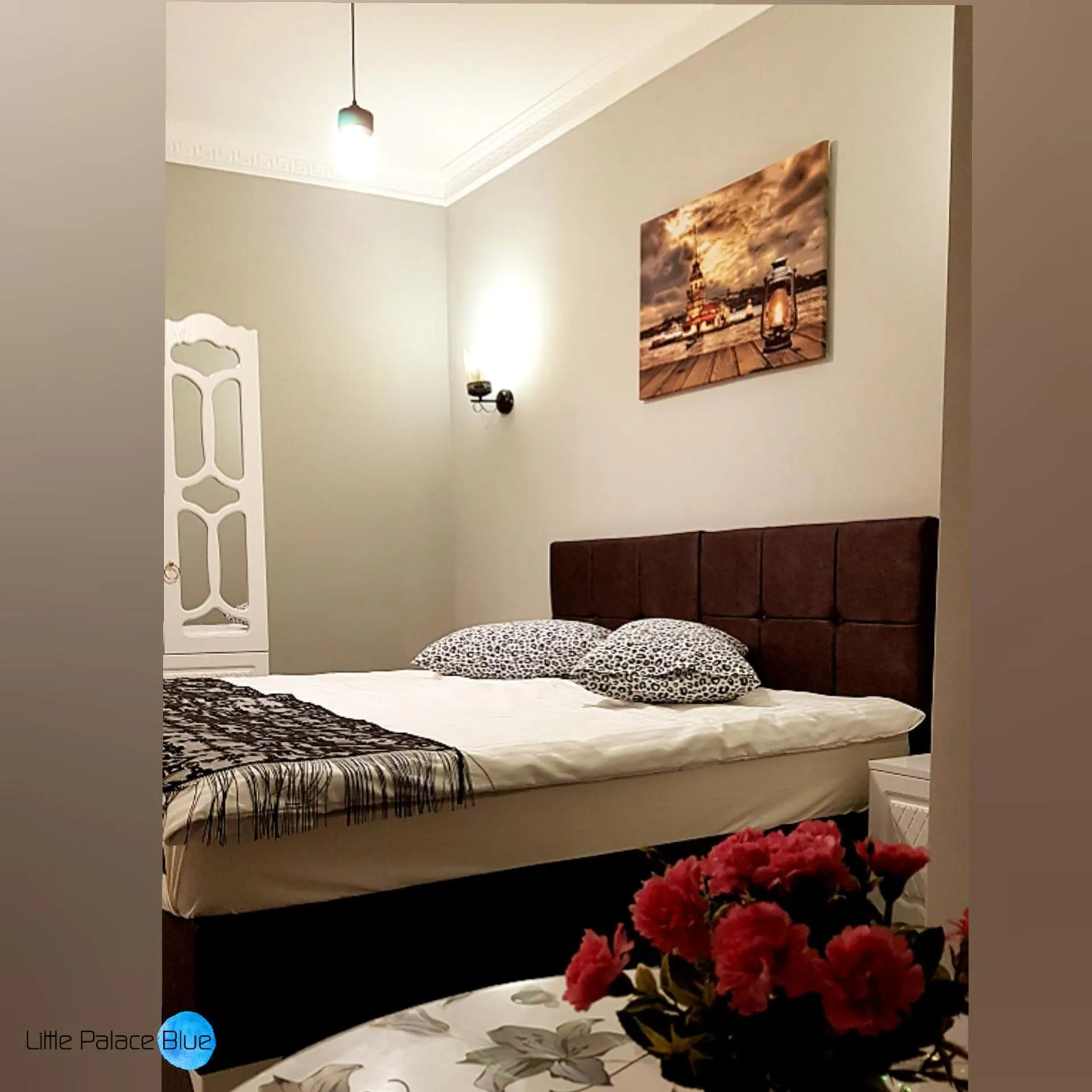 Bed in Little Palace Blue Apartment