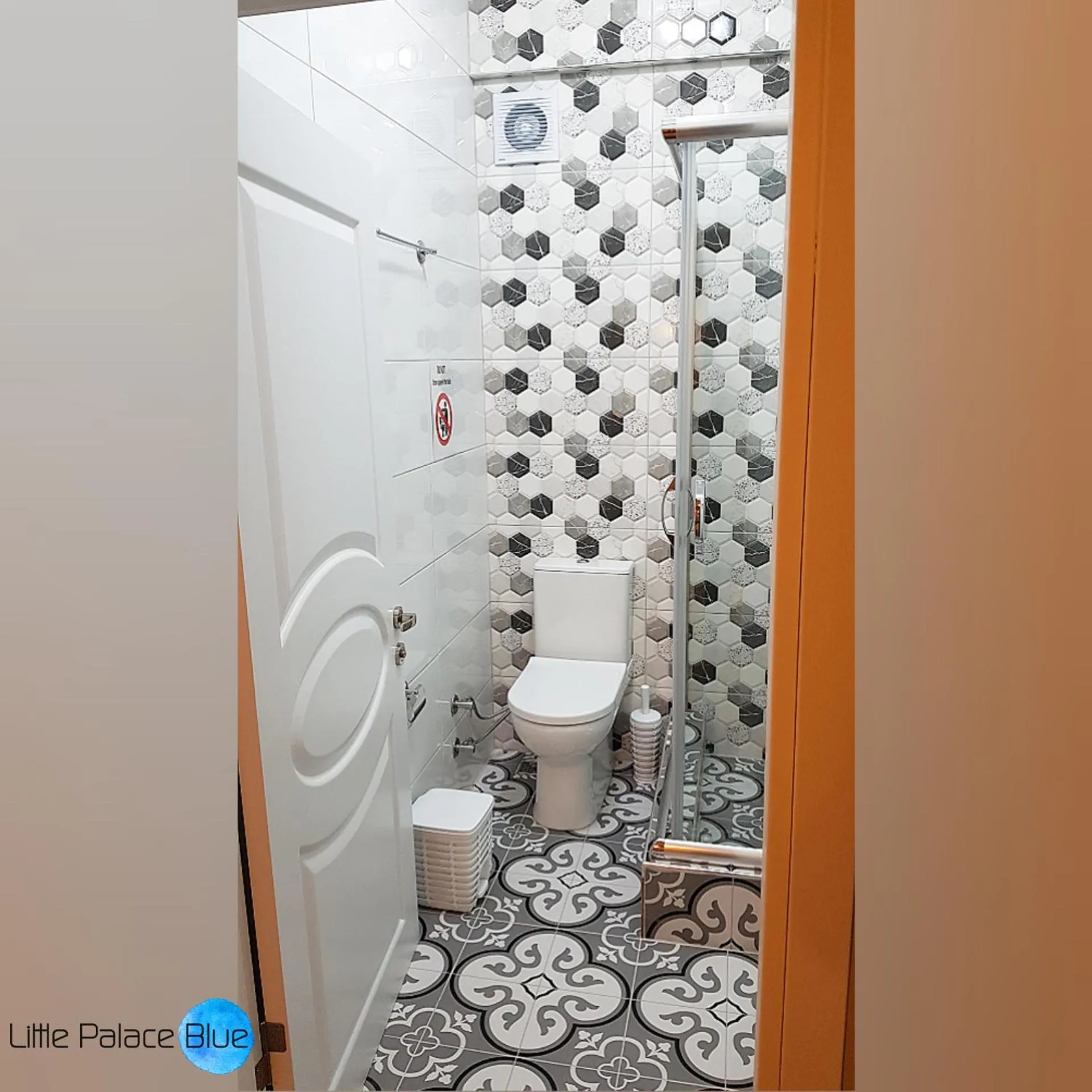 Toilet in Little Palace Blue Apartment