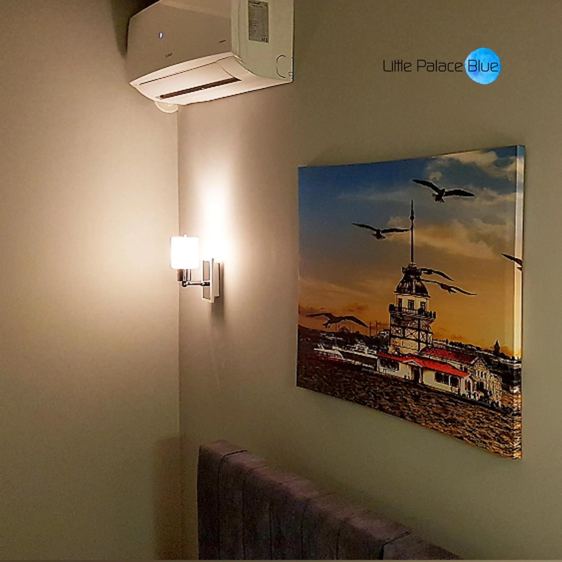 Property logo or sign in Little Palace Blue Apartment