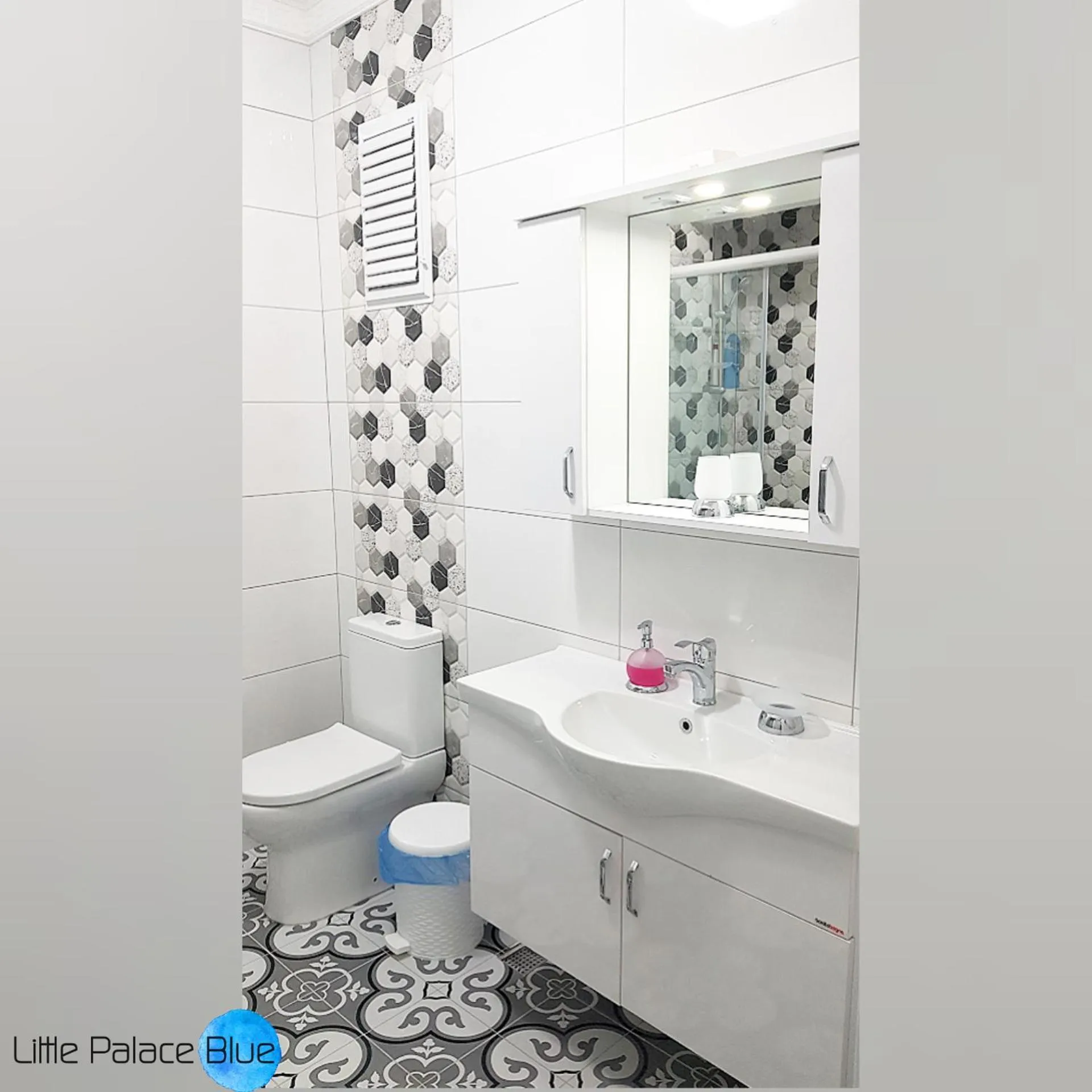 Toilet in Little Palace Blue Apartment