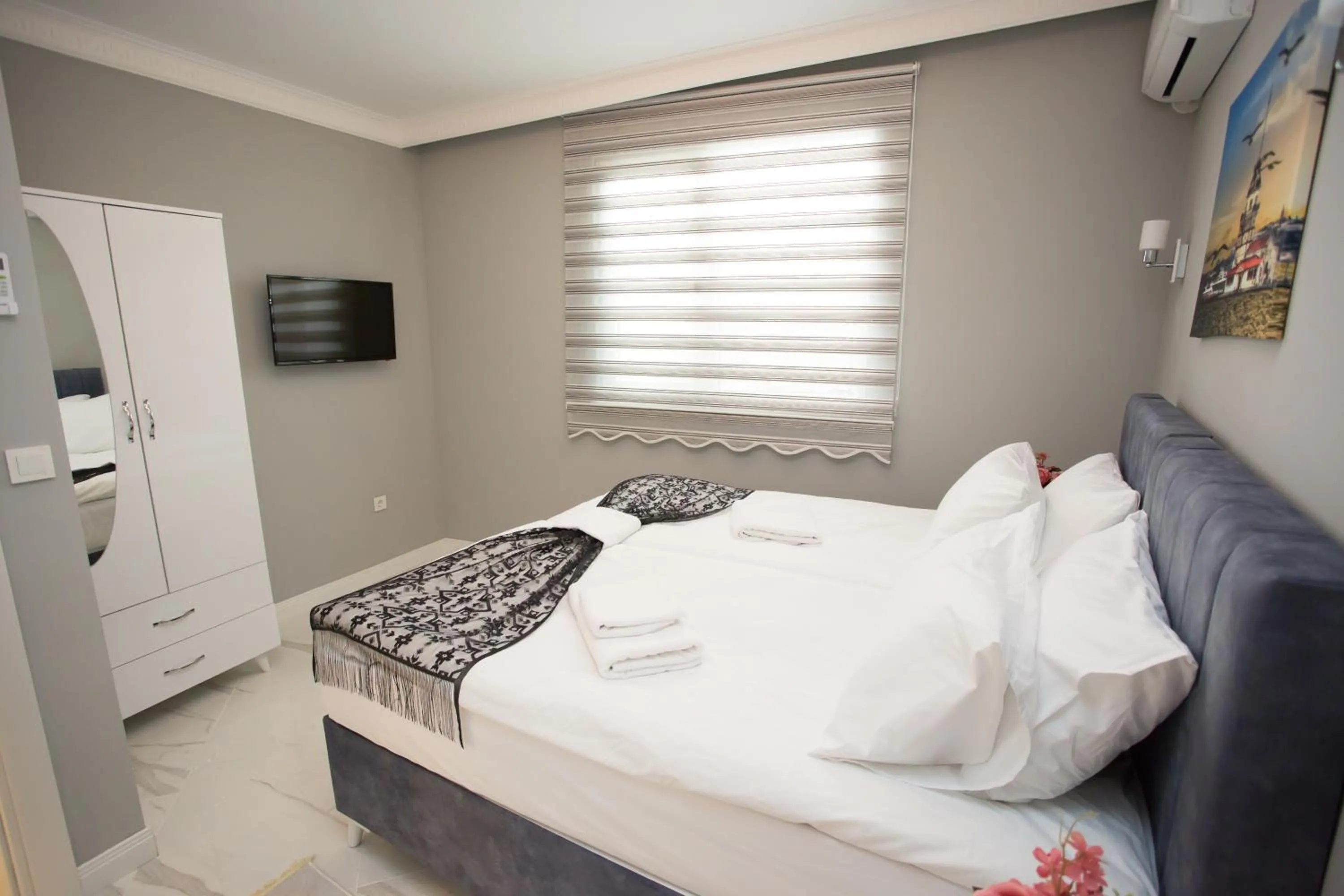 Bed in Little Palace Blue Apartment