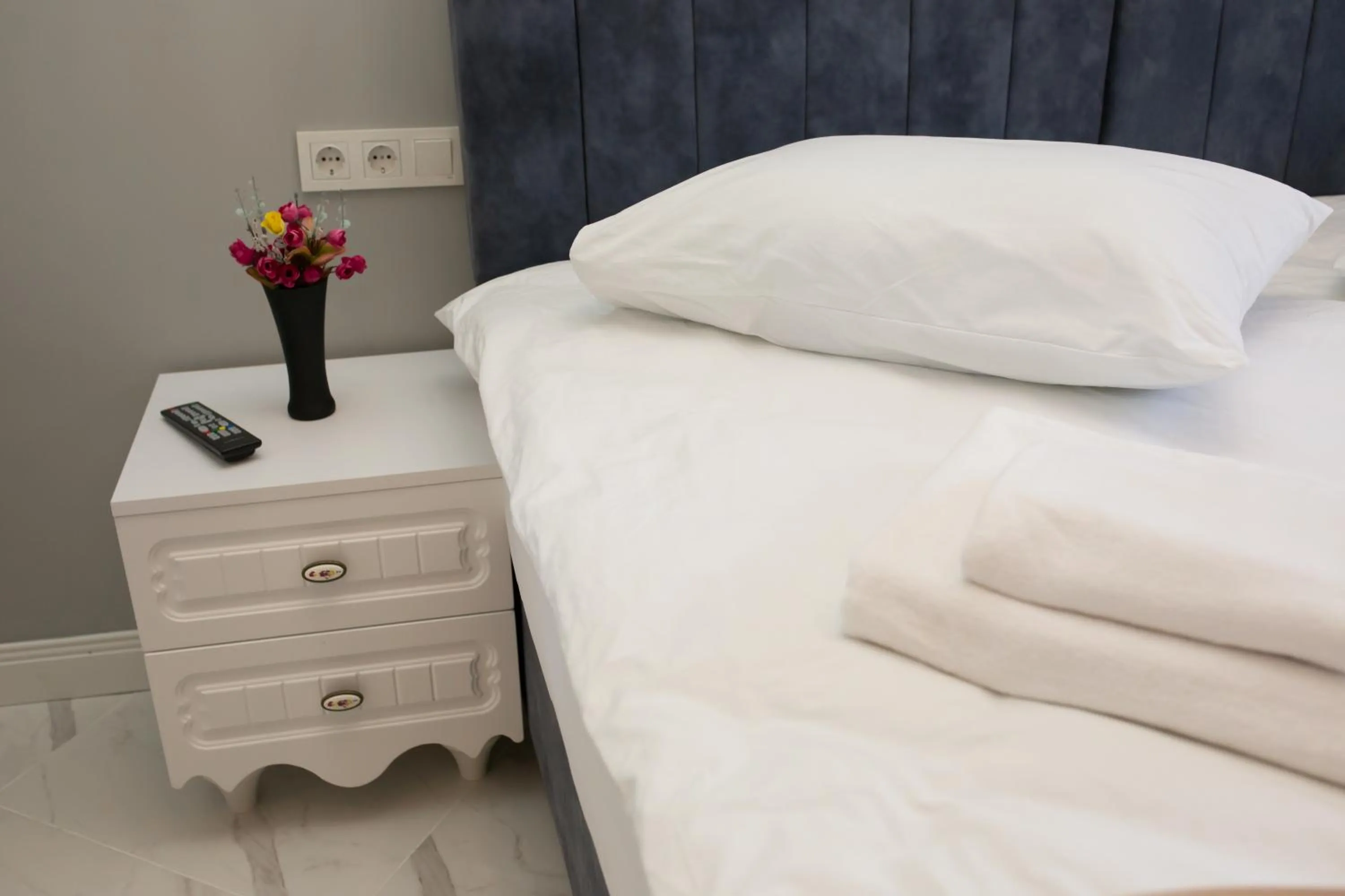 Bed in Little Palace Blue Apartment