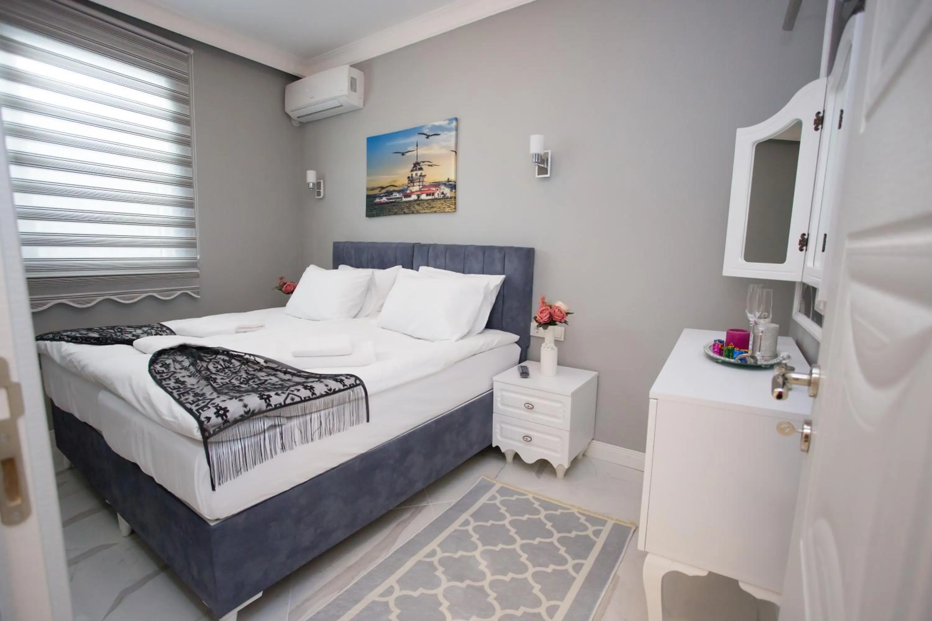 Bed in Little Palace Blue Apartment