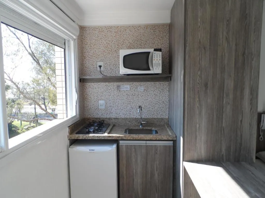 Kitchen or kitchenette in Hotel Jardim do Mar