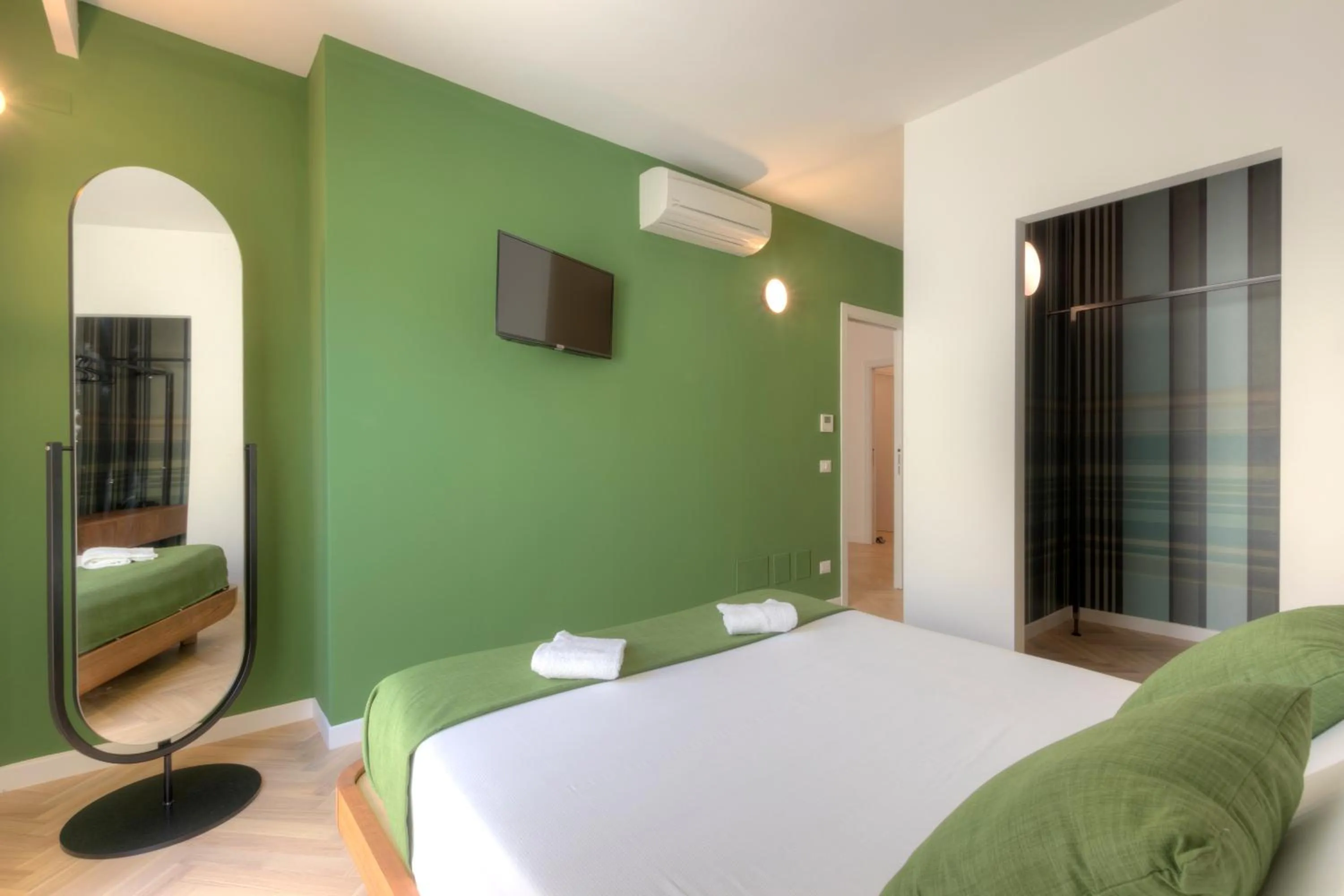 Bed in Metropolitan Suites