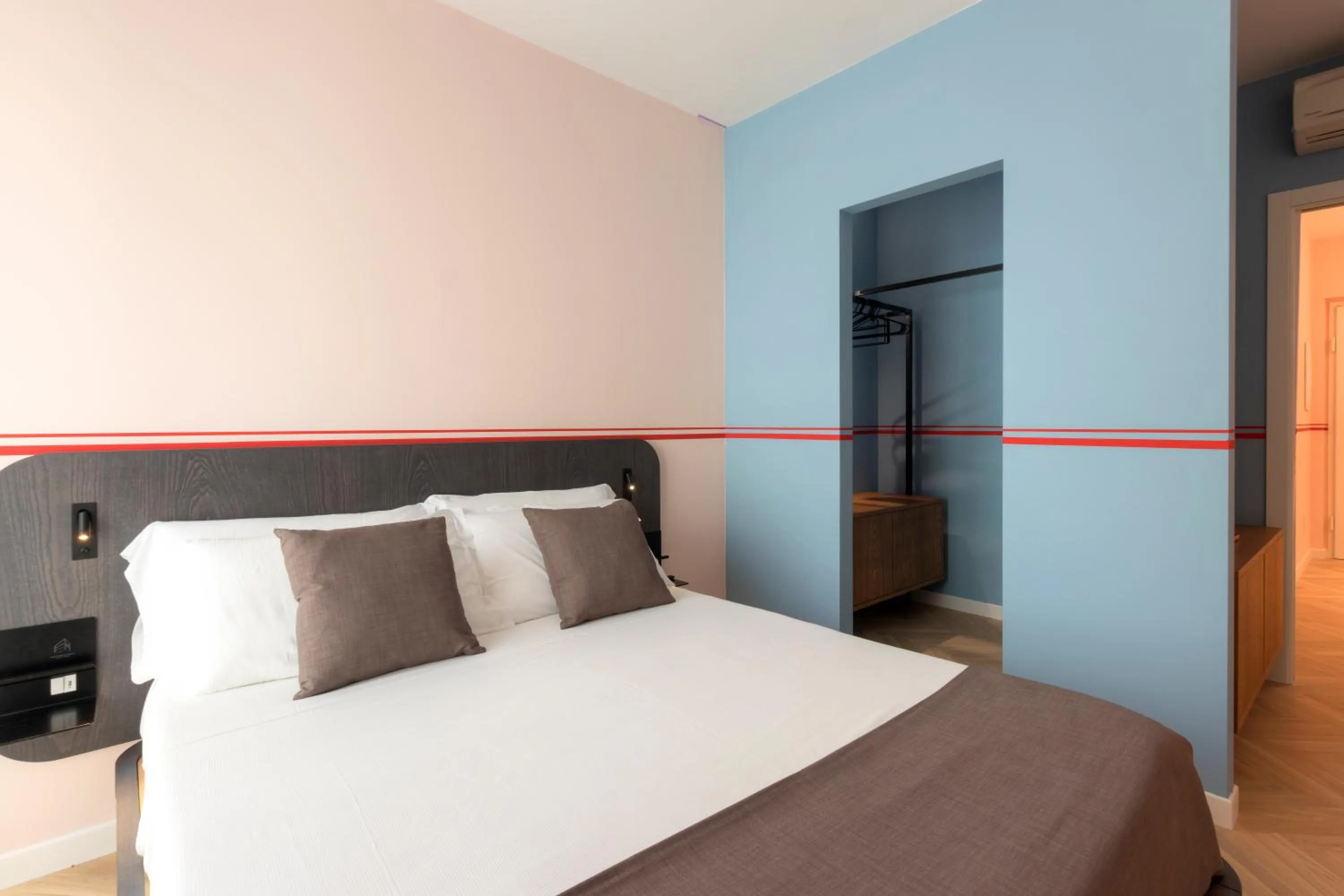 Bed in Metropolitan Suites