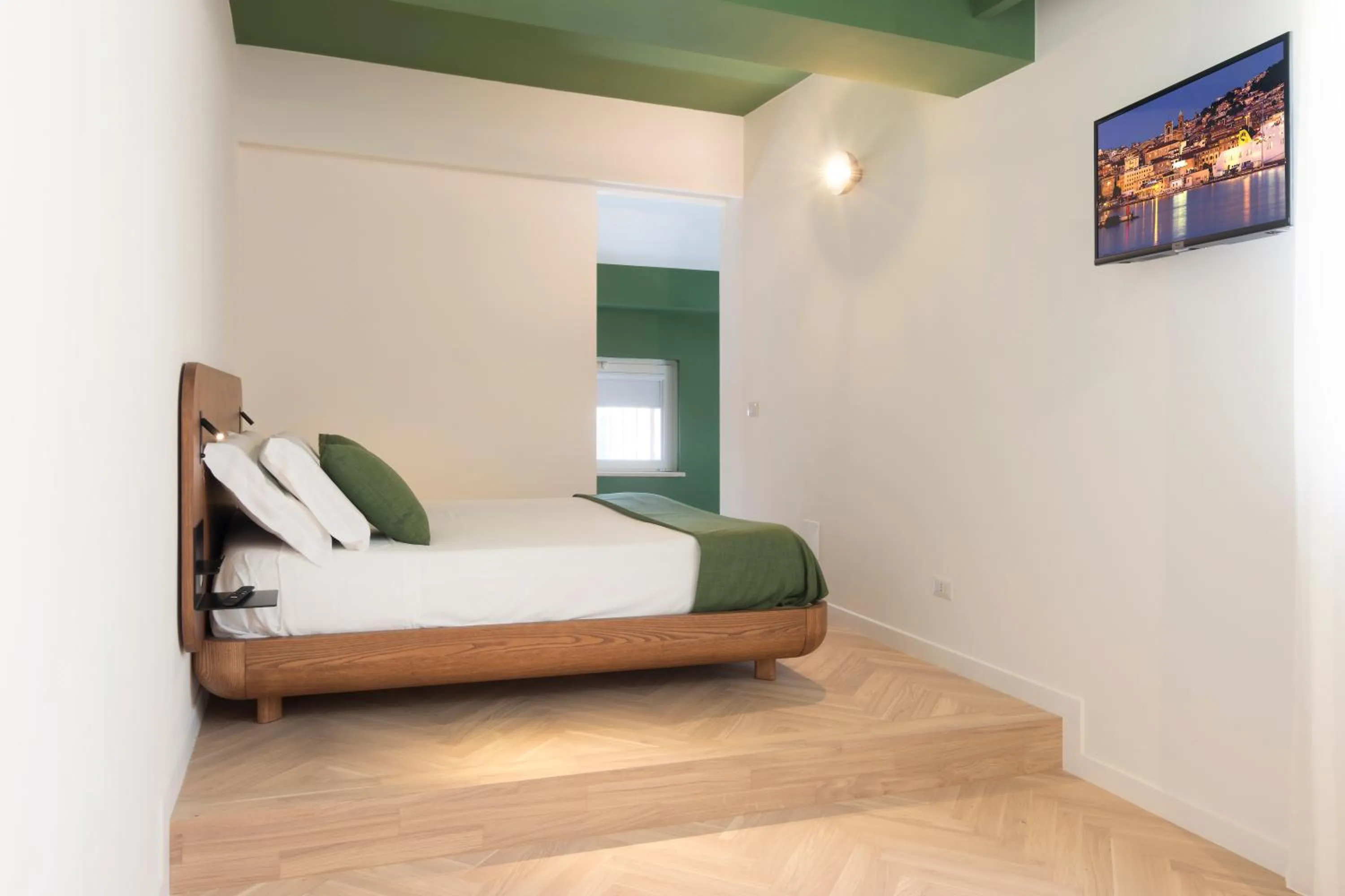 Bed in Metropolitan Suites