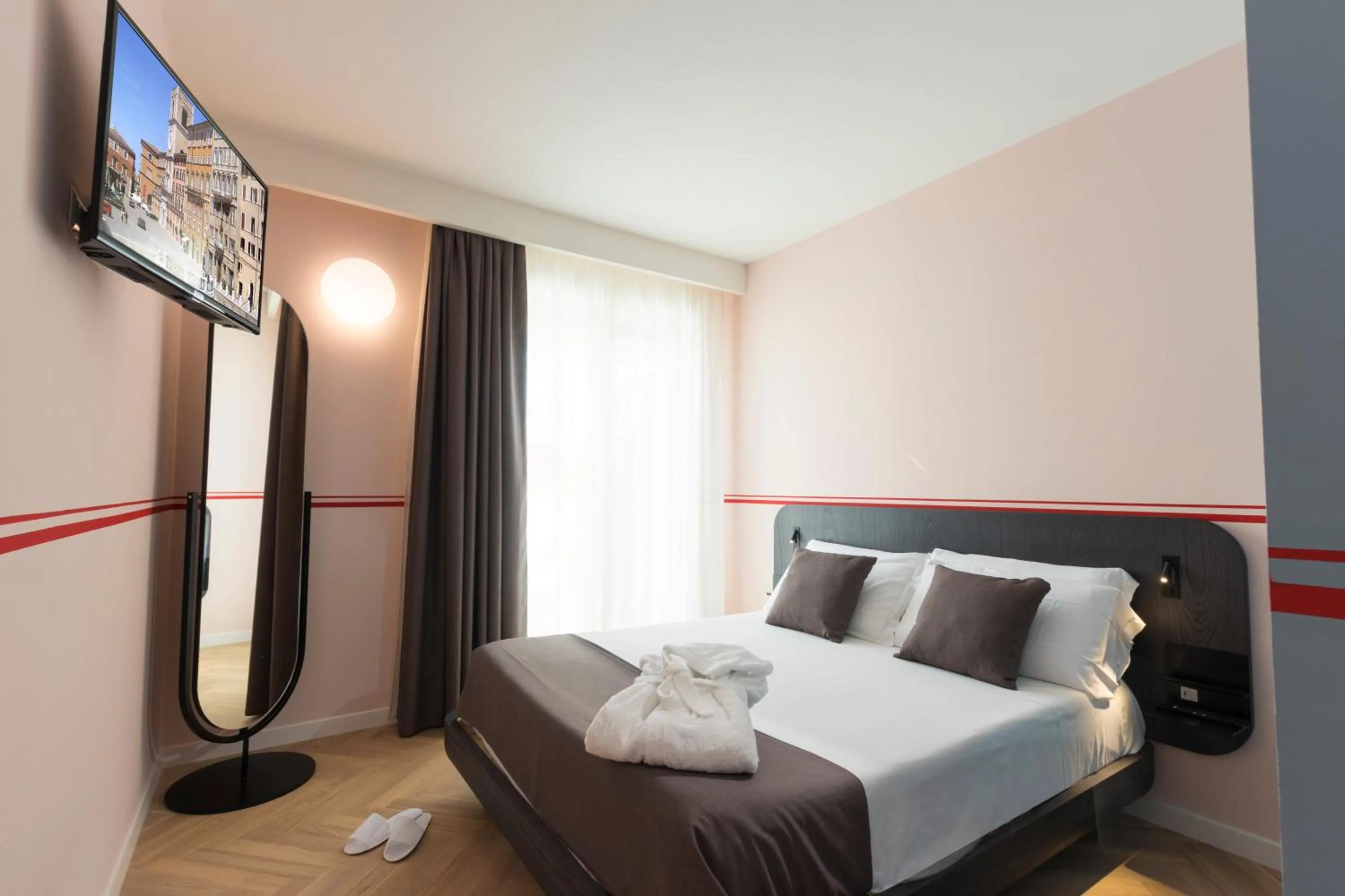 Bed in Metropolitan Suites