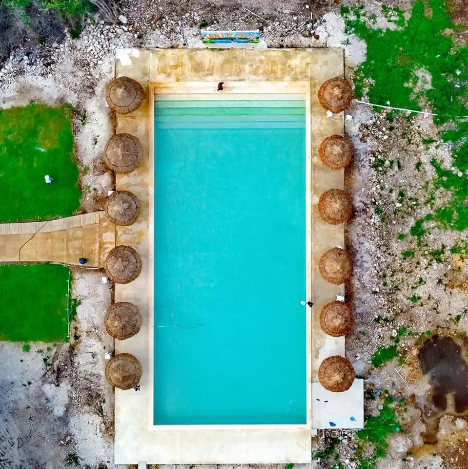 Swimming pool in Cabañas Santa Cruz Homún