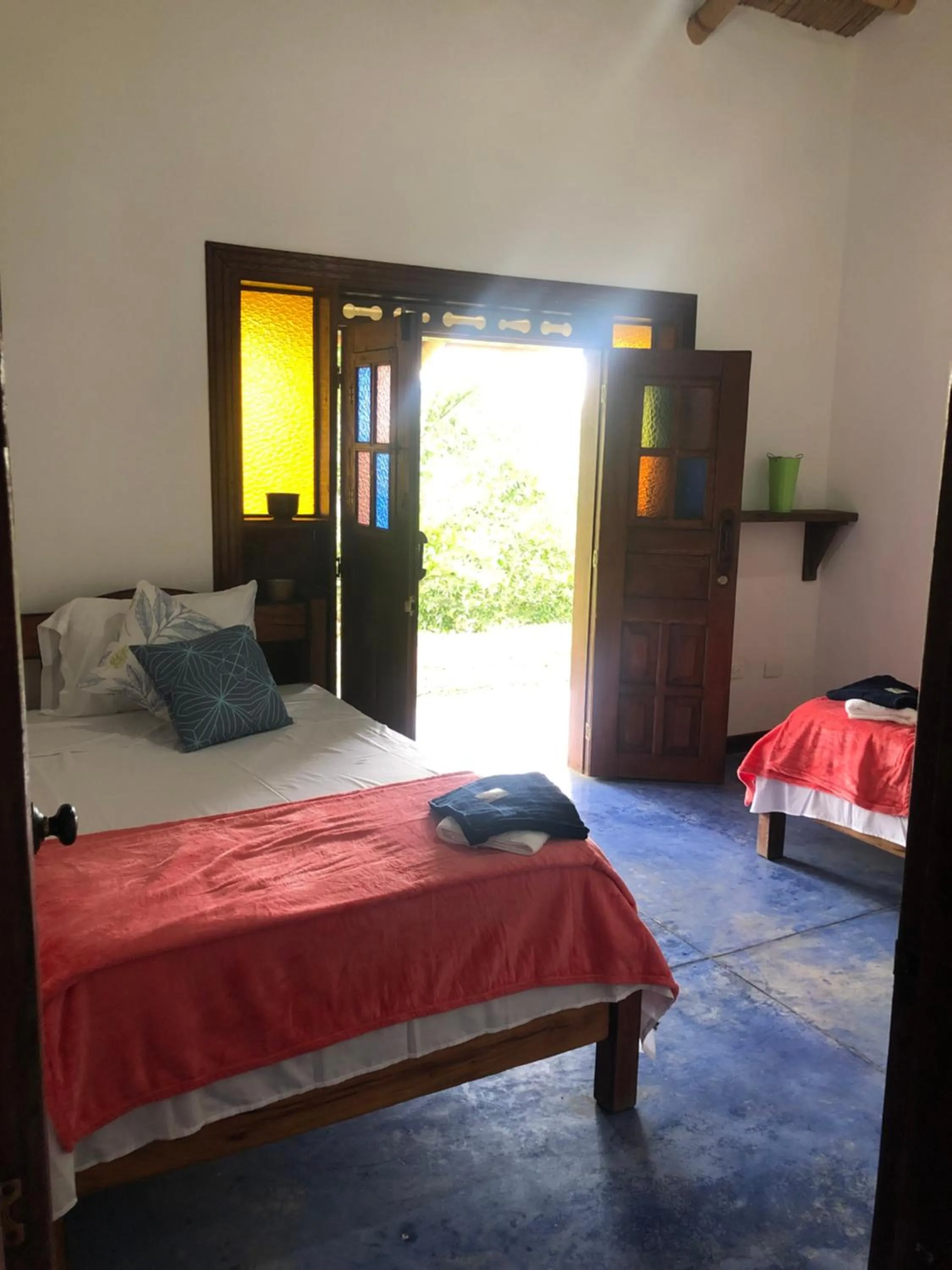 Bed in Finca Hotel Brasilia