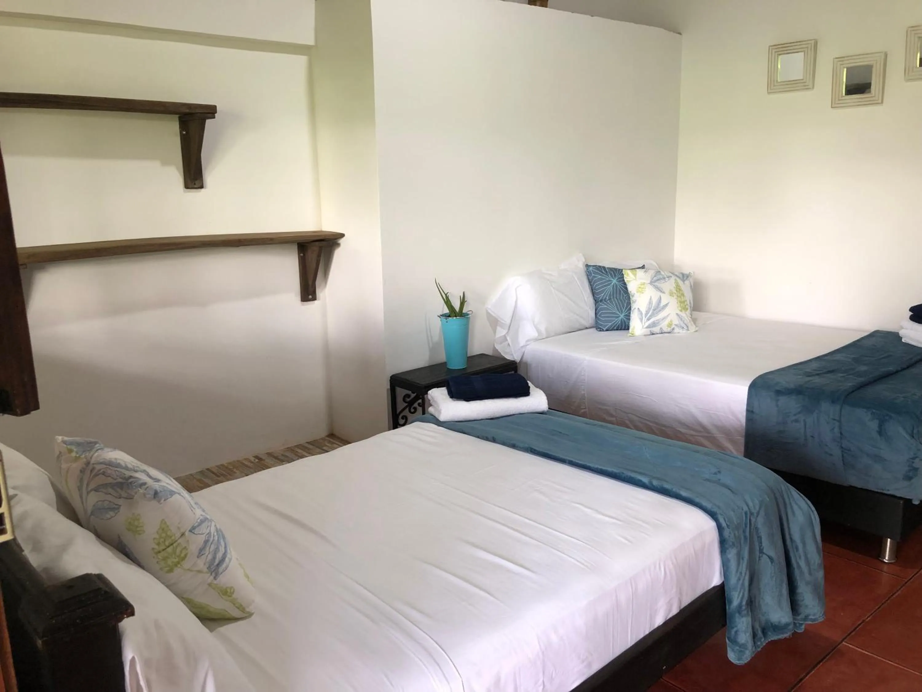 Bed in Finca Hotel Brasilia