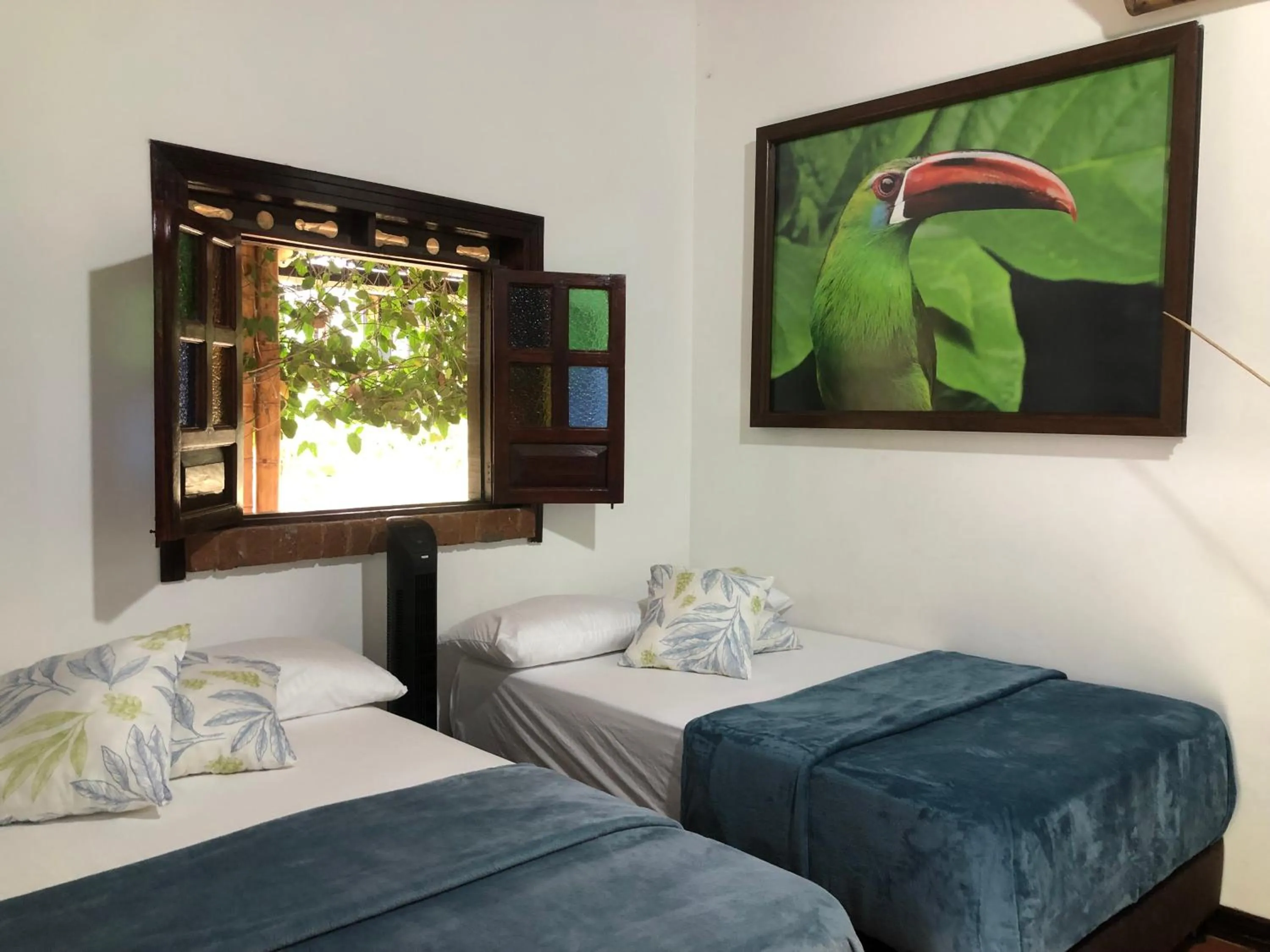 Bed in Finca Hotel Brasilia