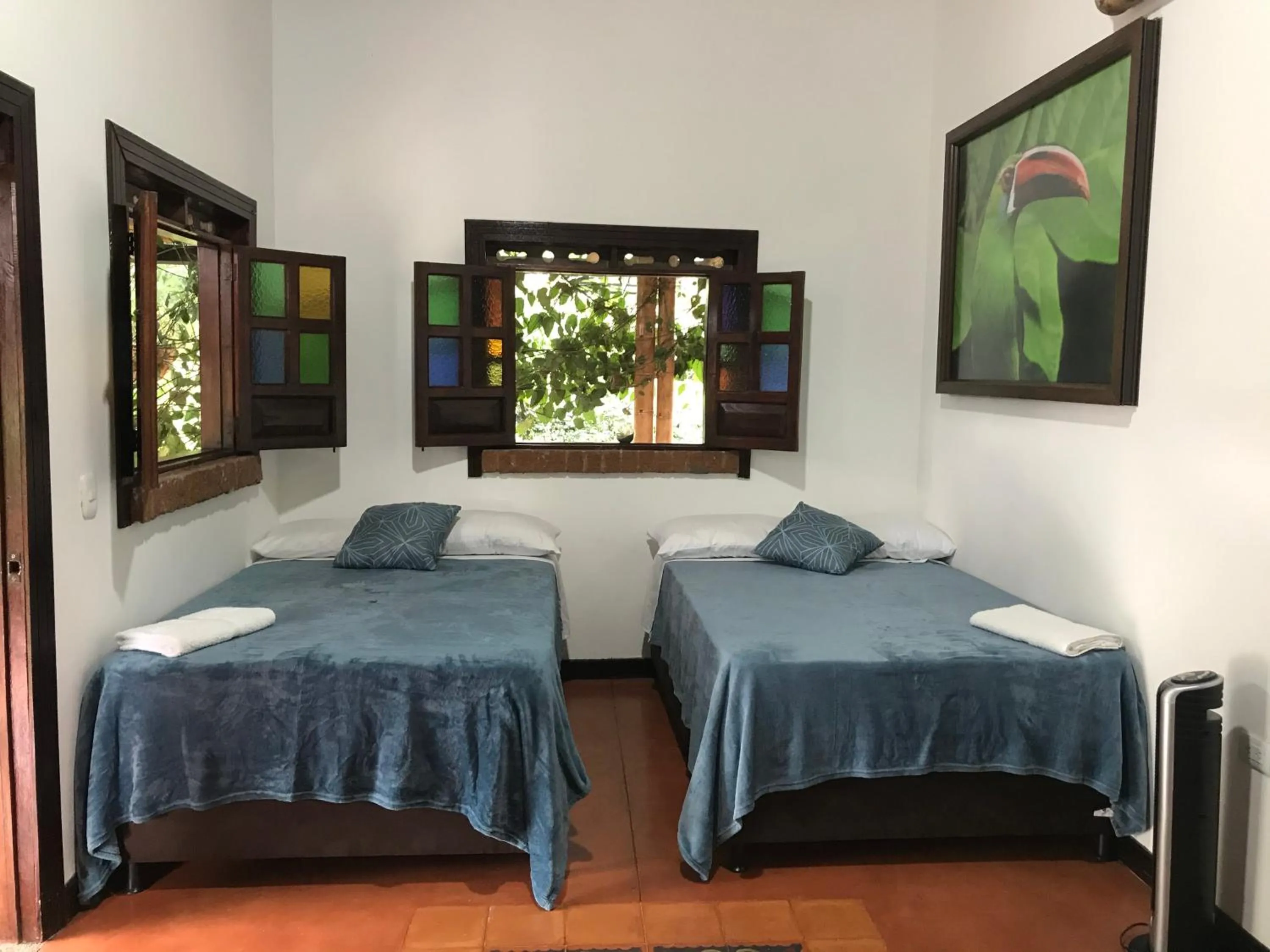 Bed in Finca Hotel Brasilia