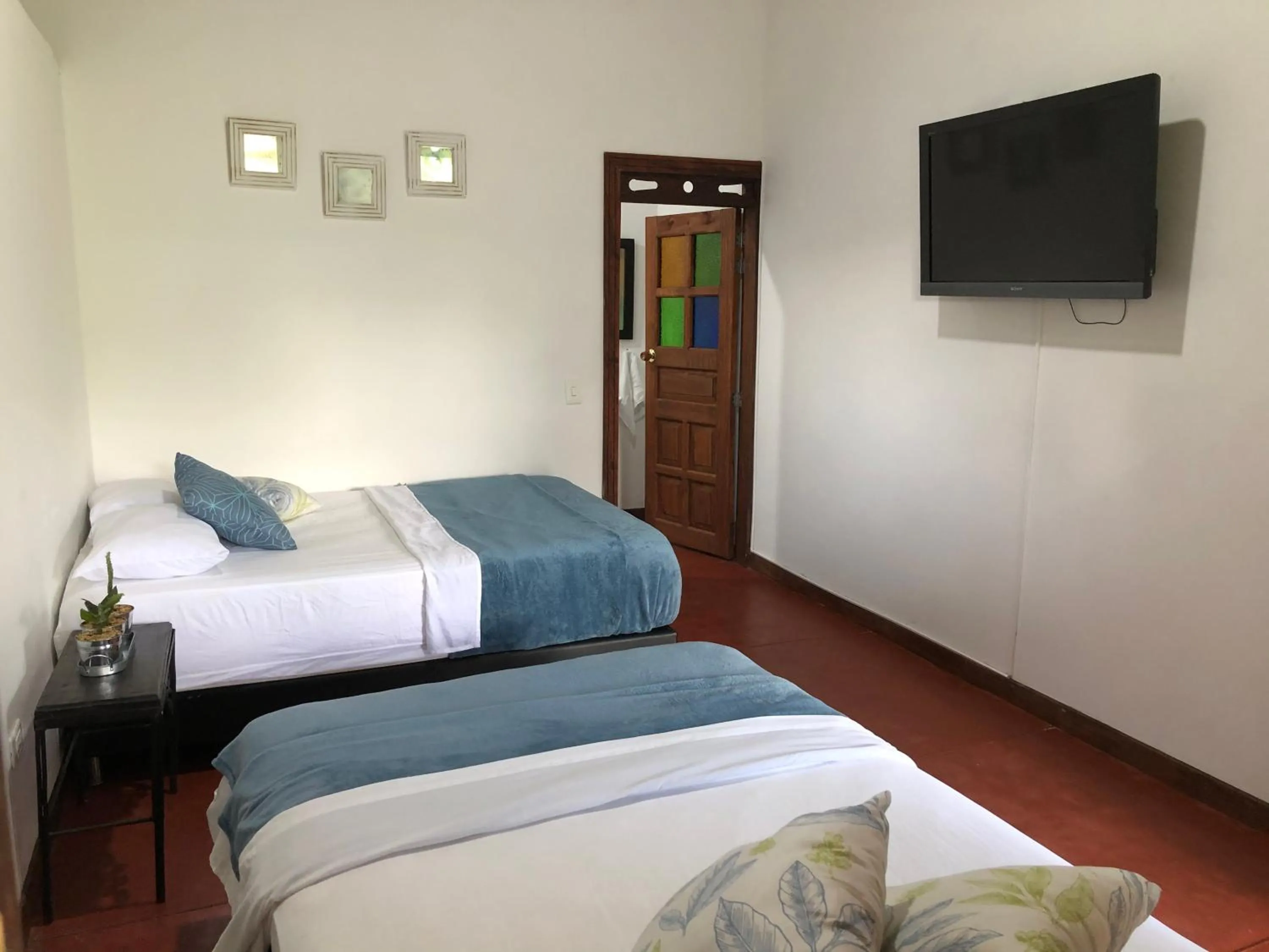 Bed in Finca Hotel Brasilia