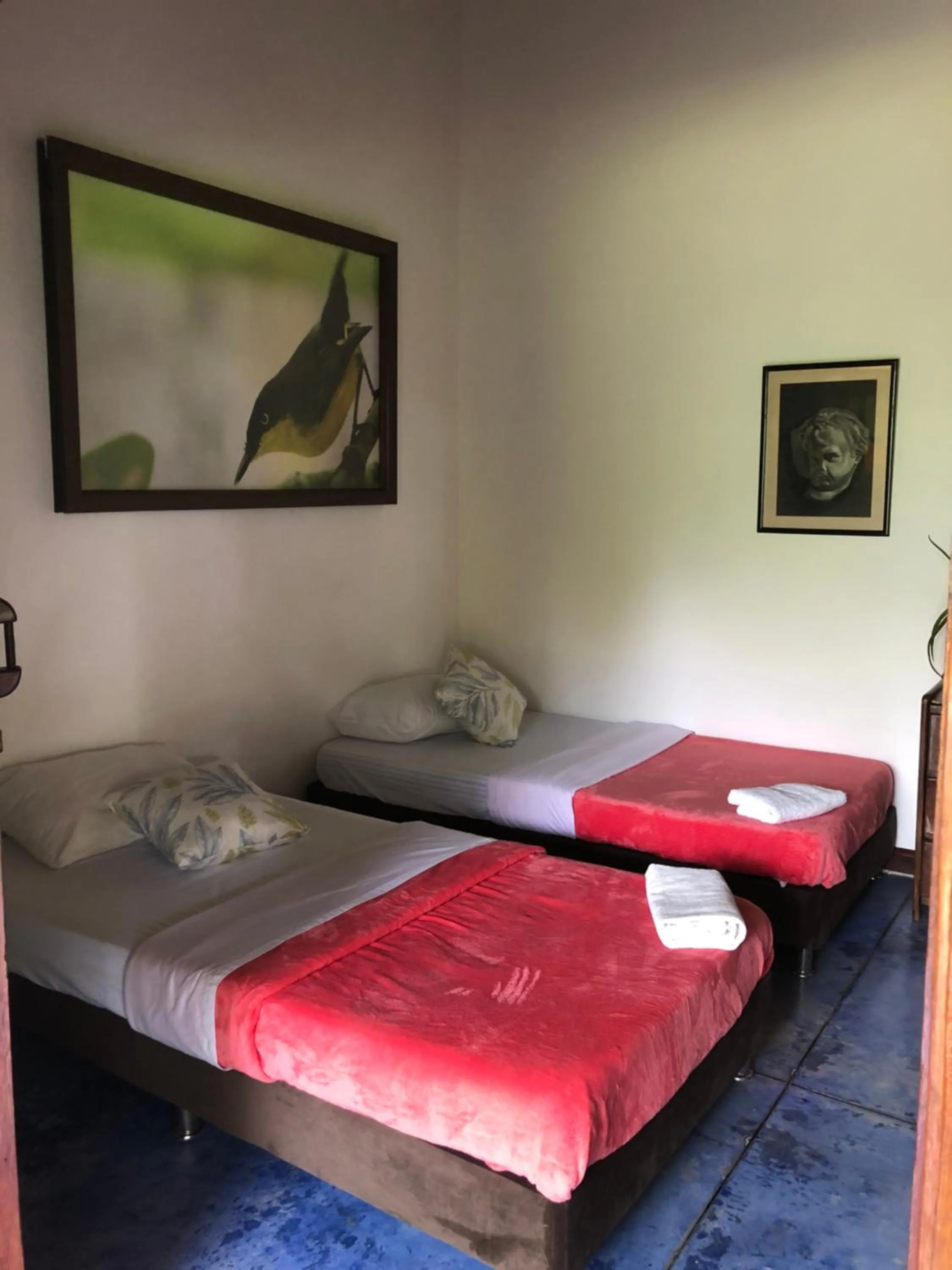 Bed in Finca Hotel Brasilia