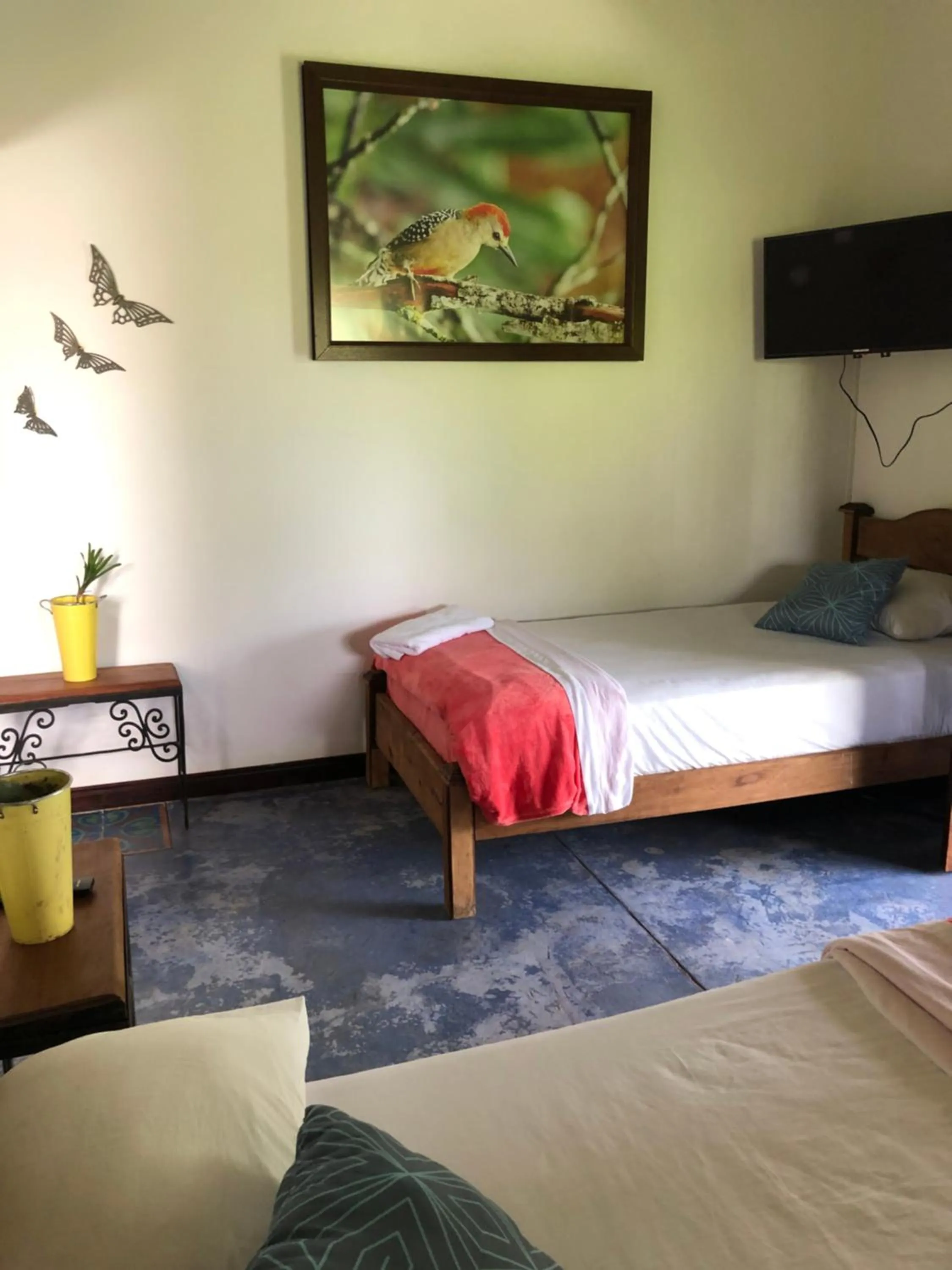 Bed in Finca Hotel Brasilia