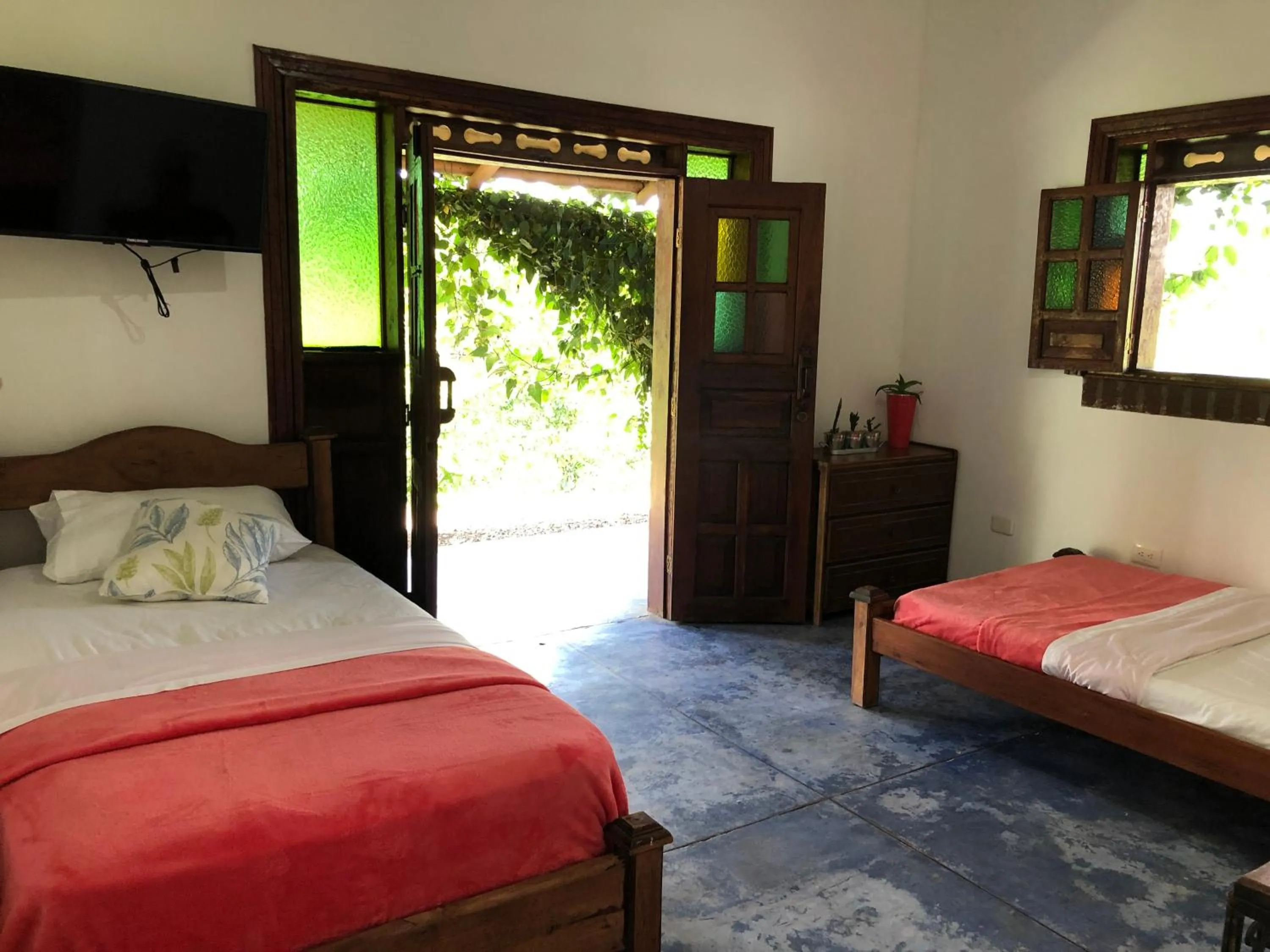 Bed in Finca Hotel Brasilia