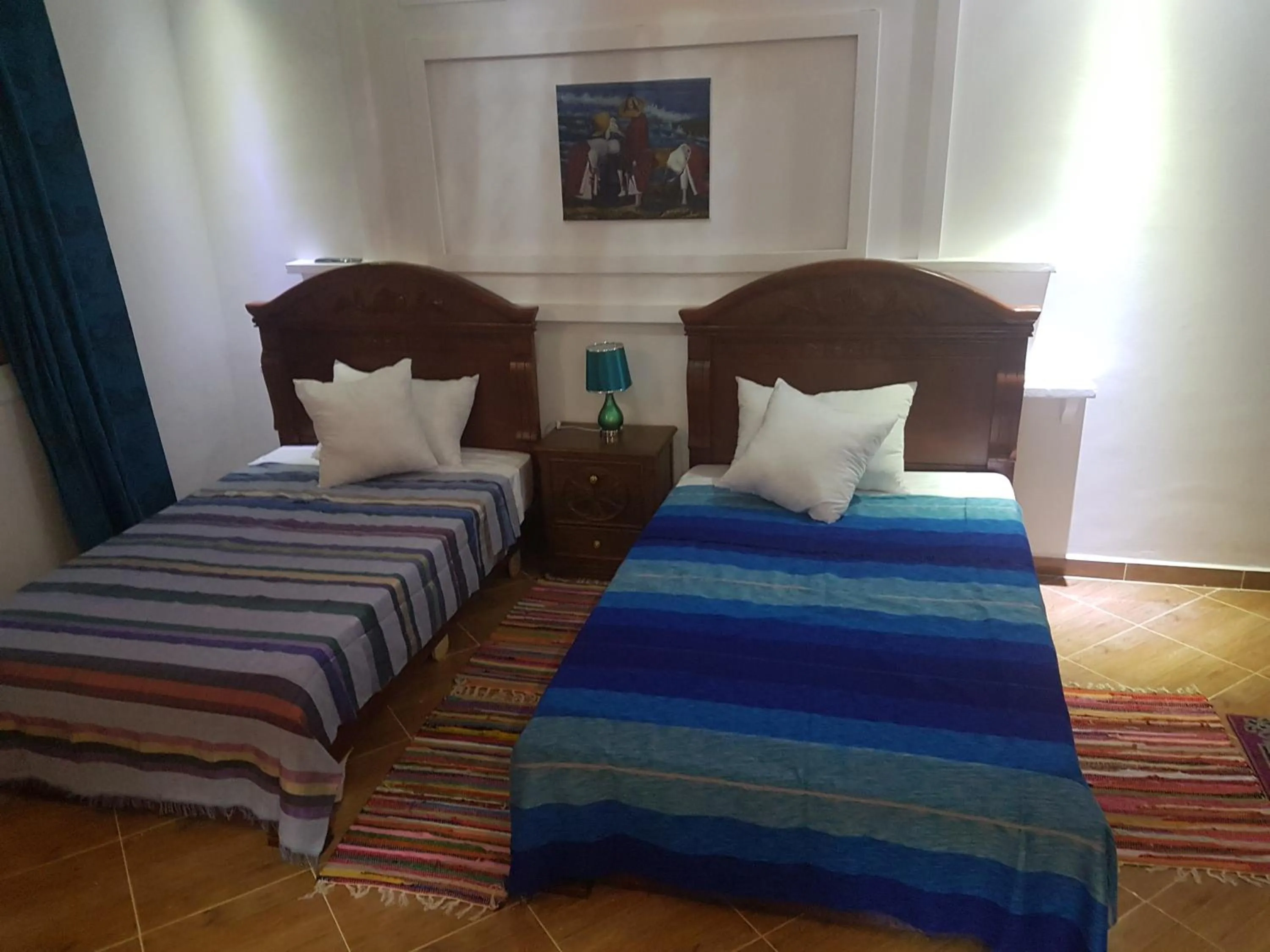 Bed in TANJITAN HOSPITALITE