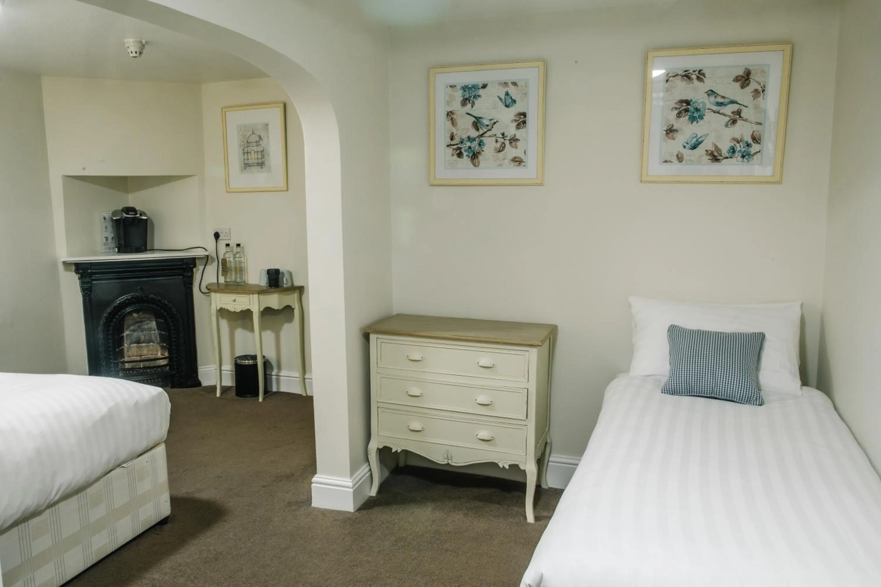 Bed in The Old Fourpenny Hotel