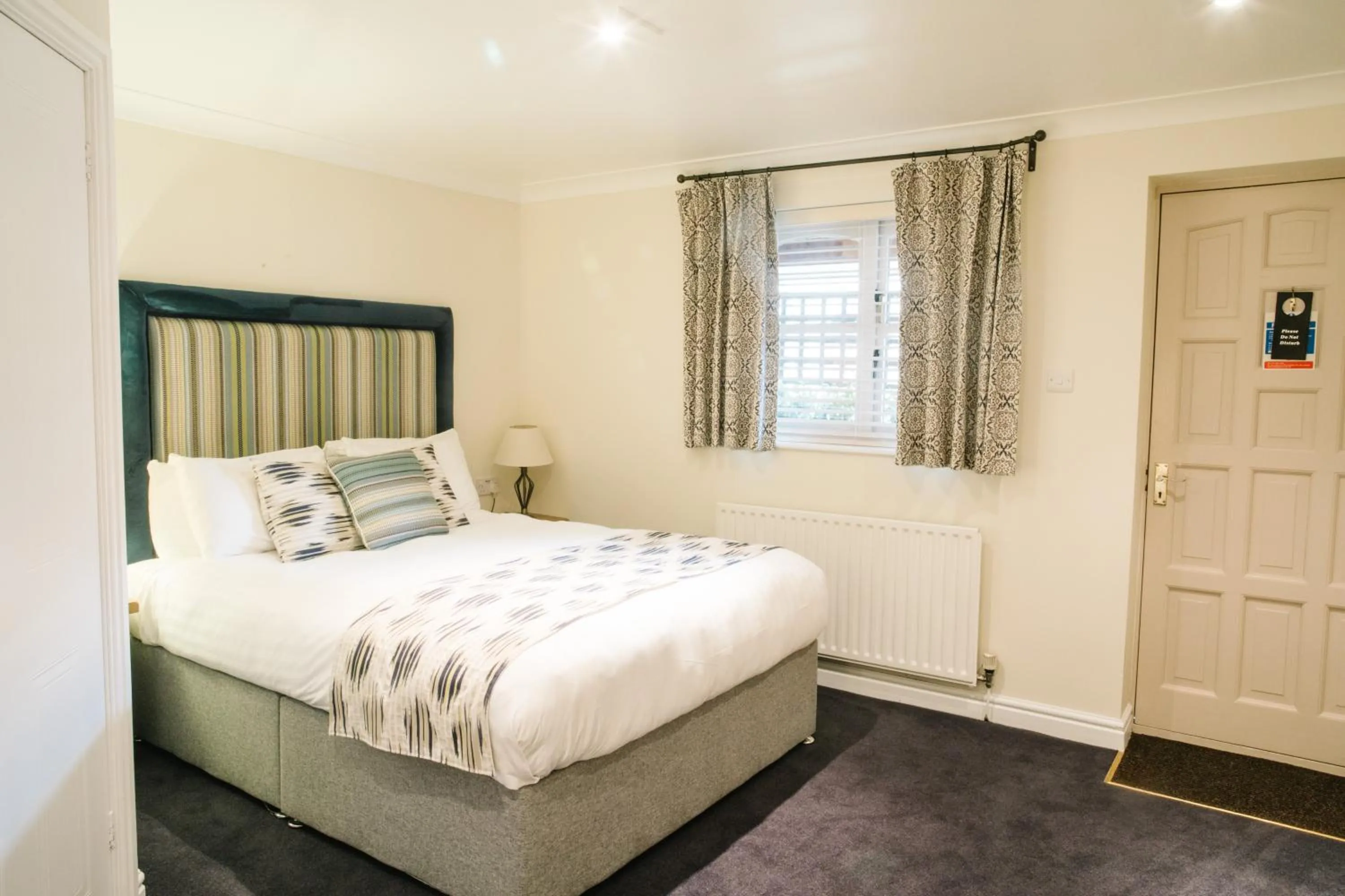 Bed in The Old Fourpenny Hotel