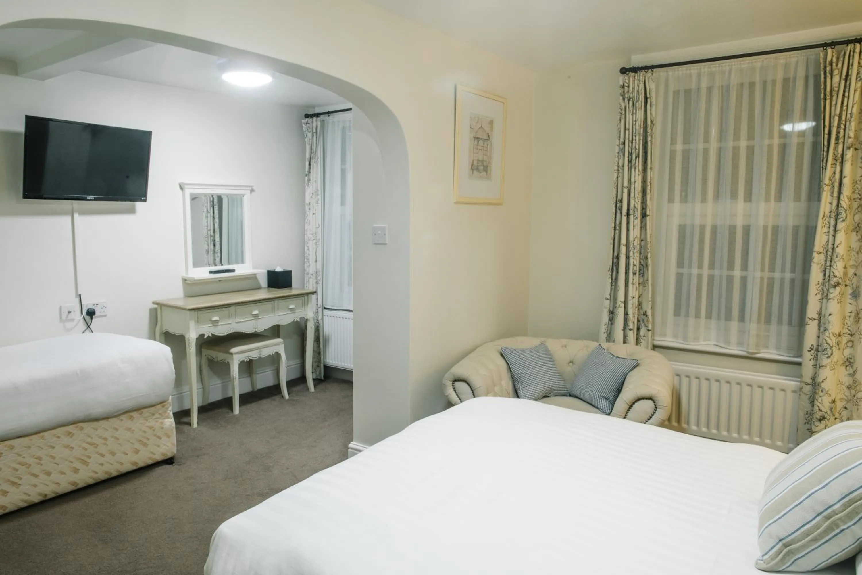 Bed in The Old Fourpenny Hotel