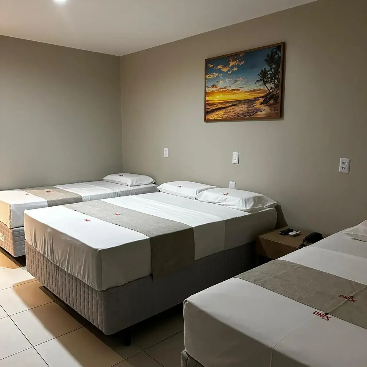 Standard Quadruple Room in Onix Hotel Aeroporto Standard Quadruple Room in Onix Hotel Aeroporto