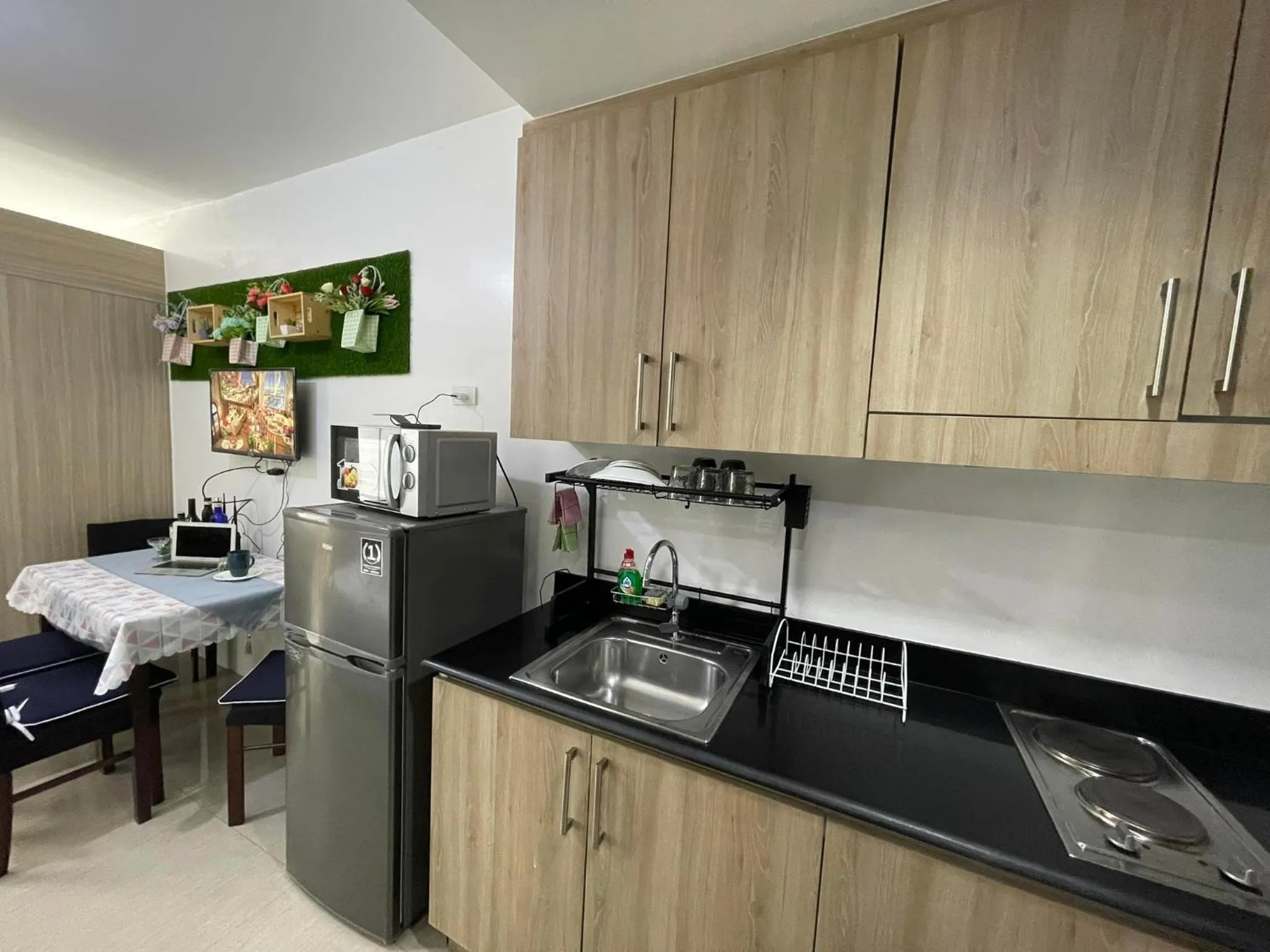 Kitchen or kitchenette in Shore Residences, Mall Of Asia Complex Stayction by PBYY