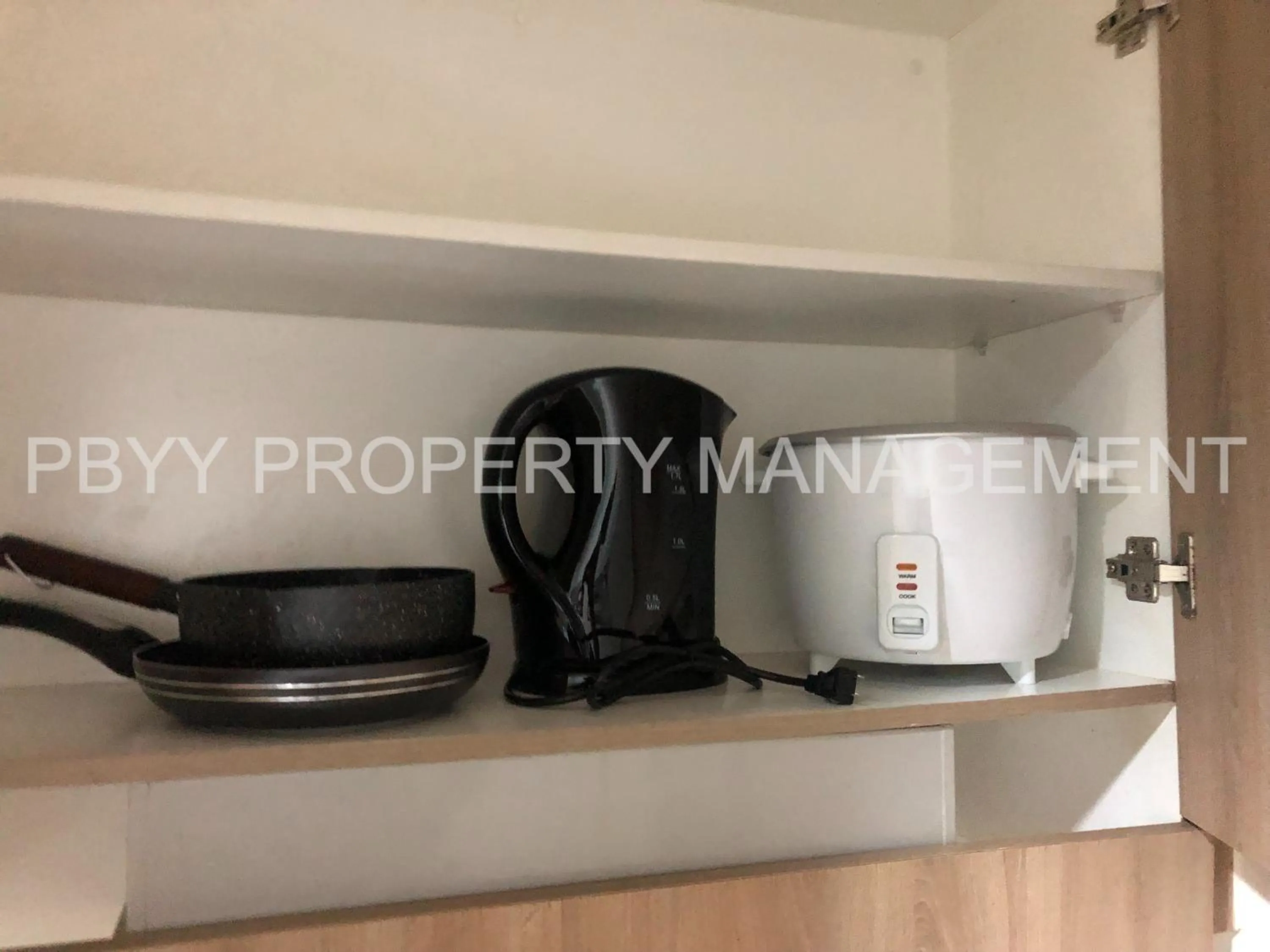 Kitchen or kitchenette in Shore Residences, Mall Of Asia Complex Stayction by PBYY