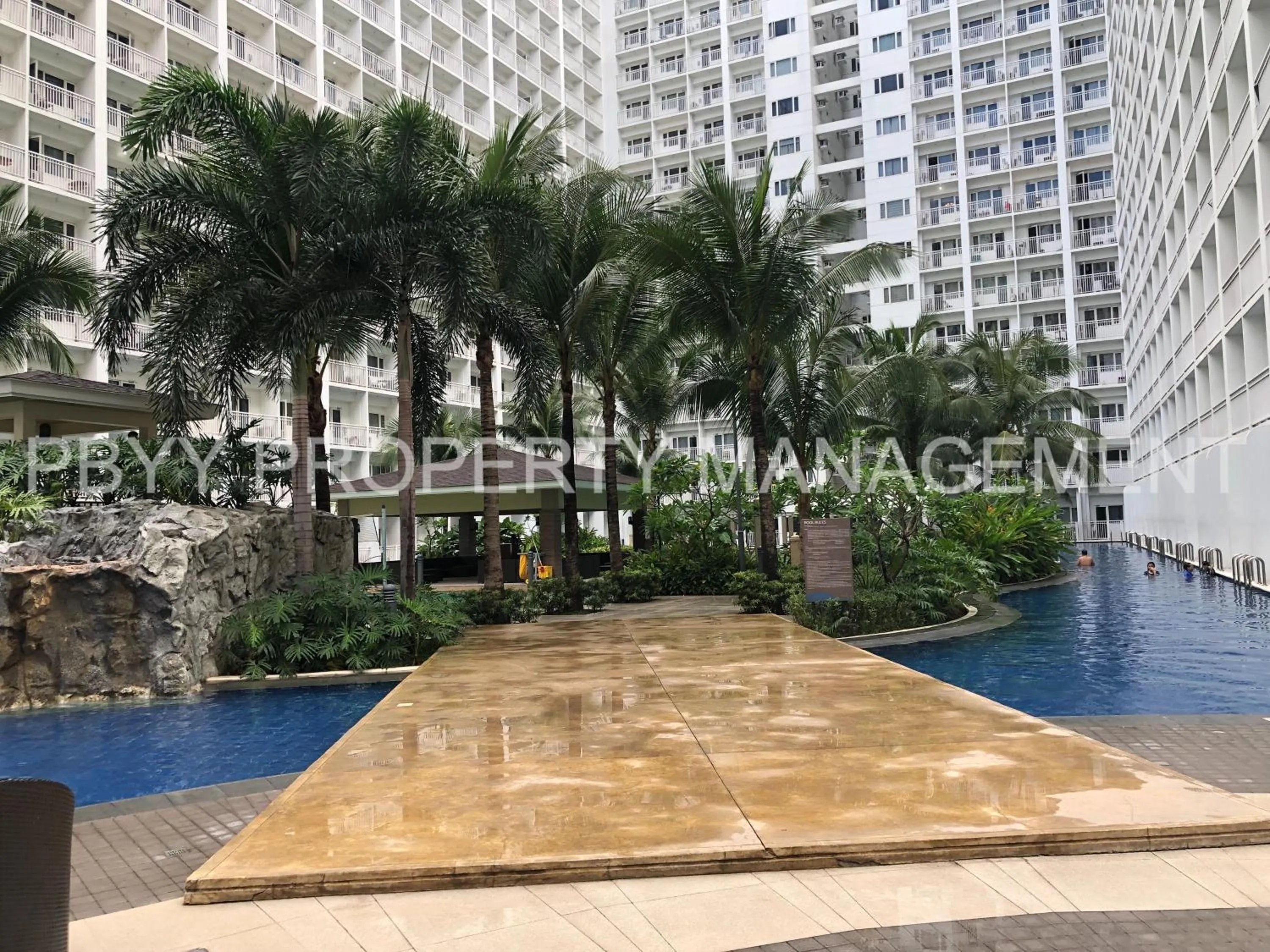 Swimming pool in Shore Residences, Mall Of Asia Complex Stayction by PBYY