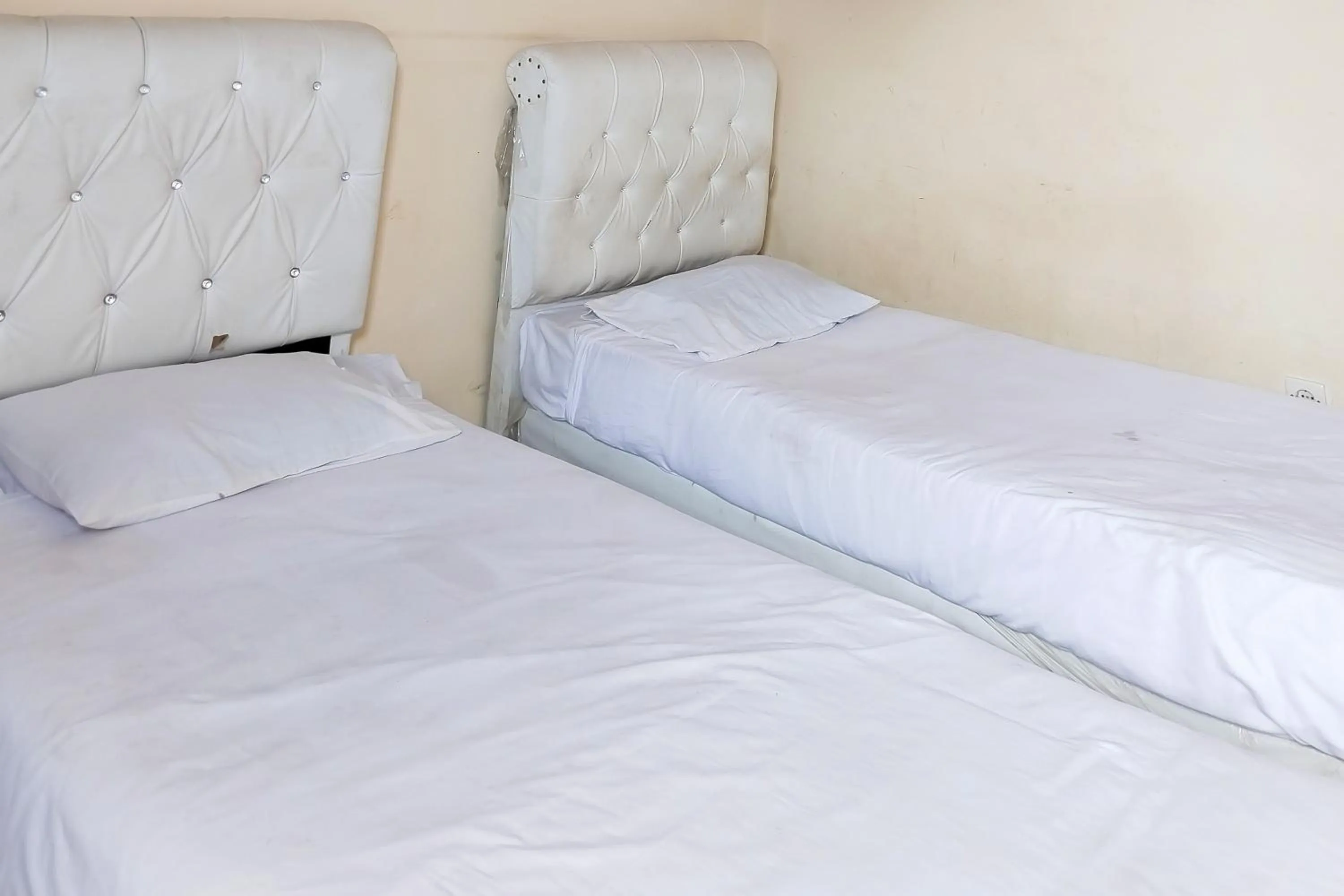 Bed in Richmond Guest House Cirebon RedPartner