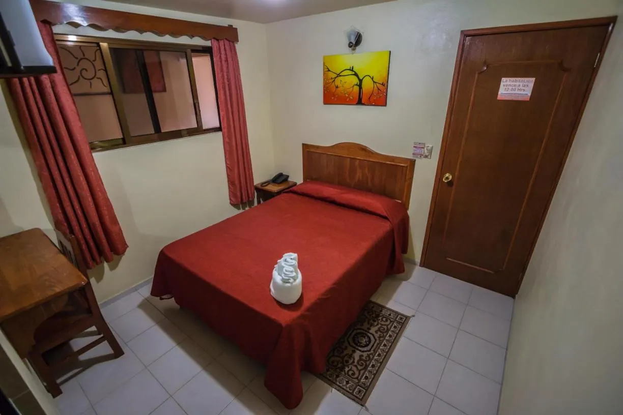 Photo of the whole room, Bed in Hotel Márquez