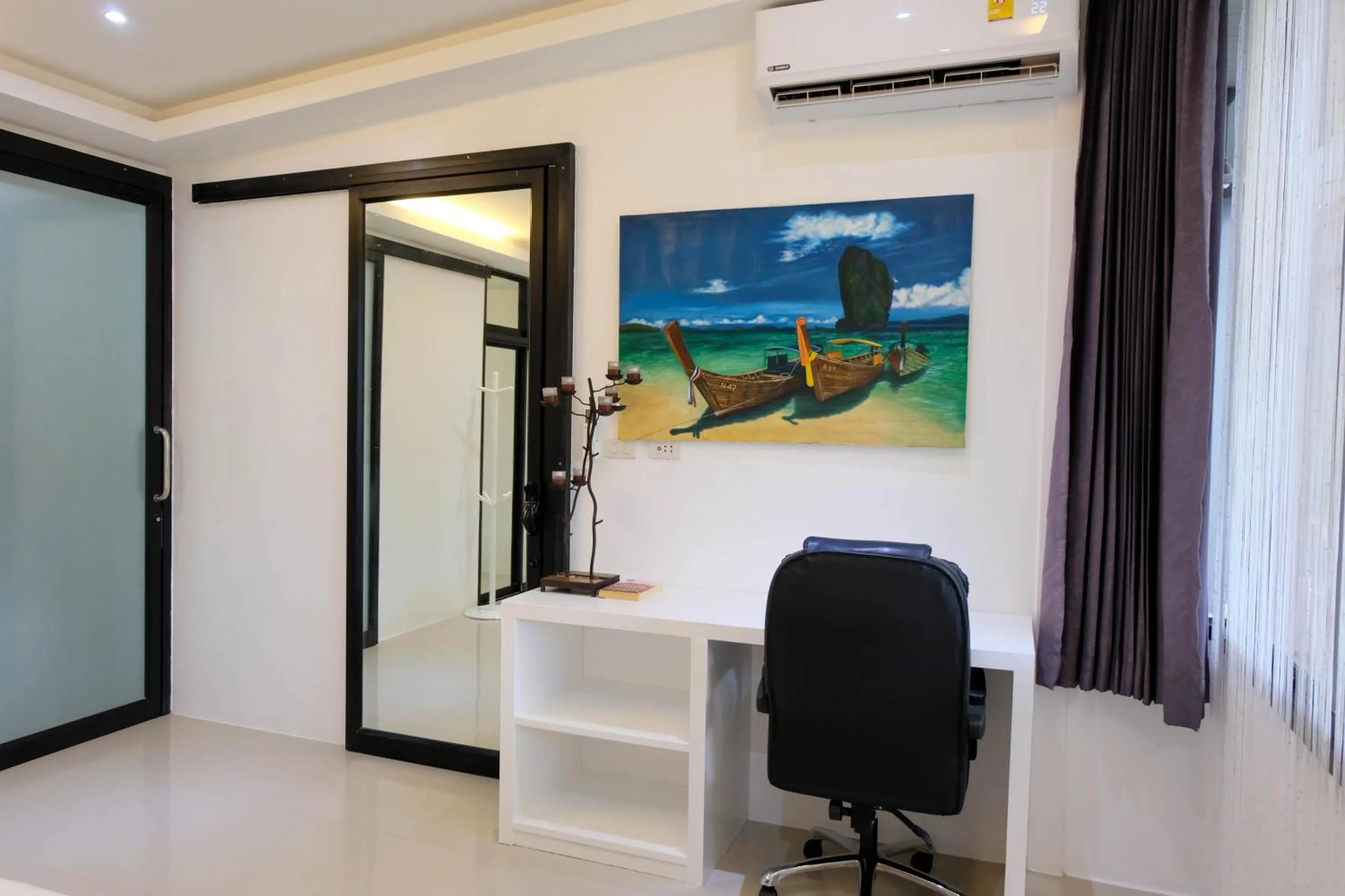 Seating area in Baan Poon Garden