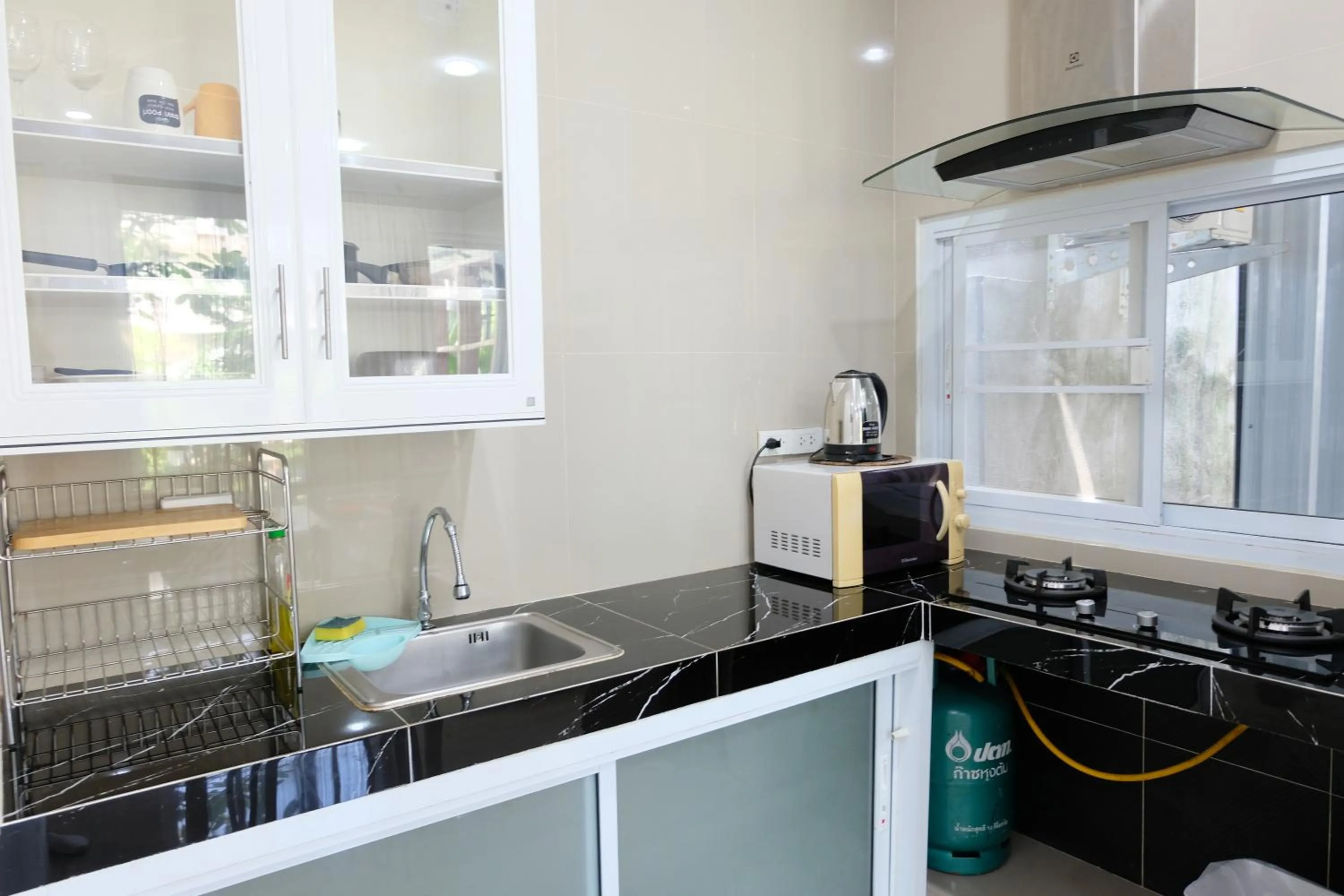 Kitchen or kitchenette in Baan Poon Garden