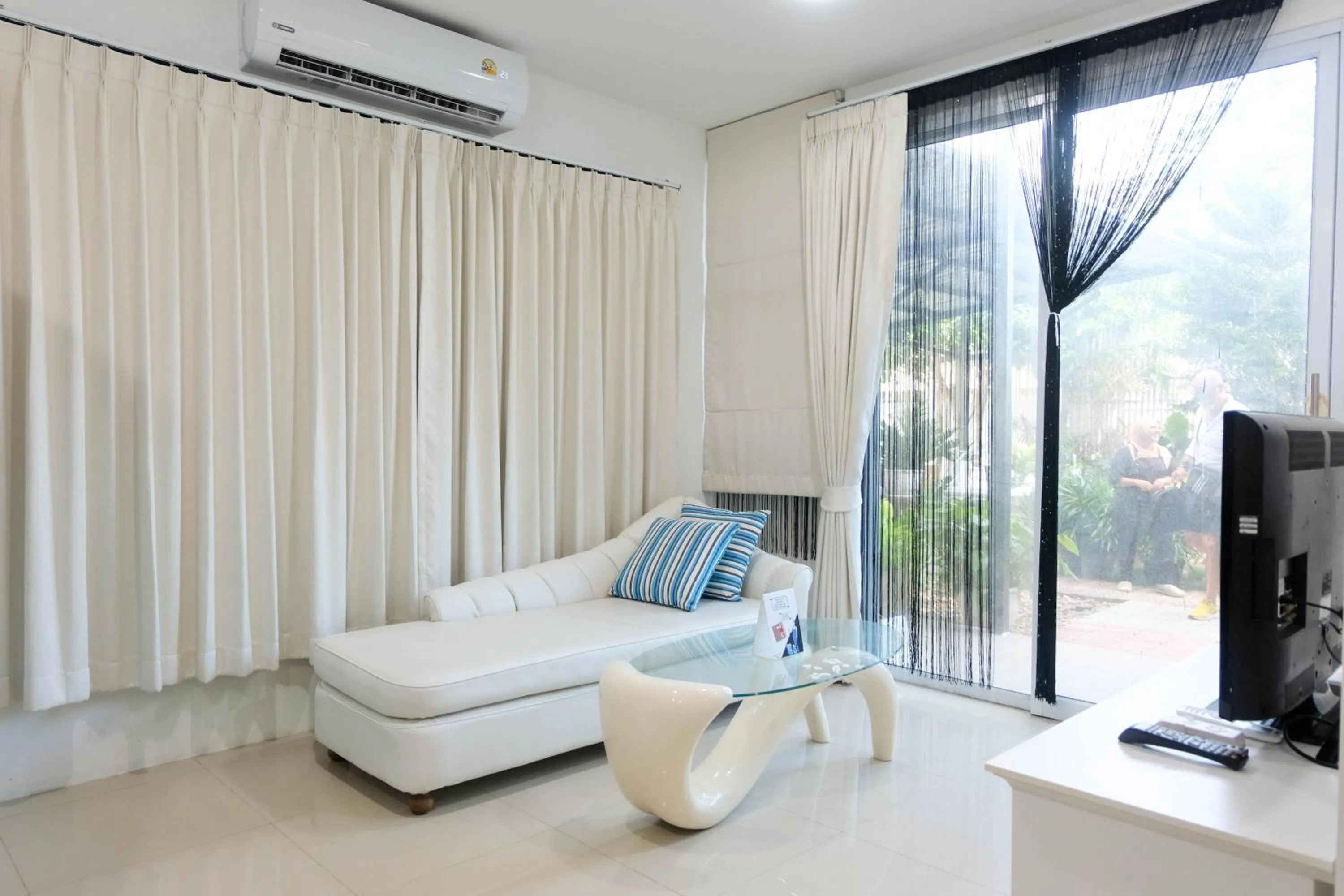 Seating area in Baan Poon Garden