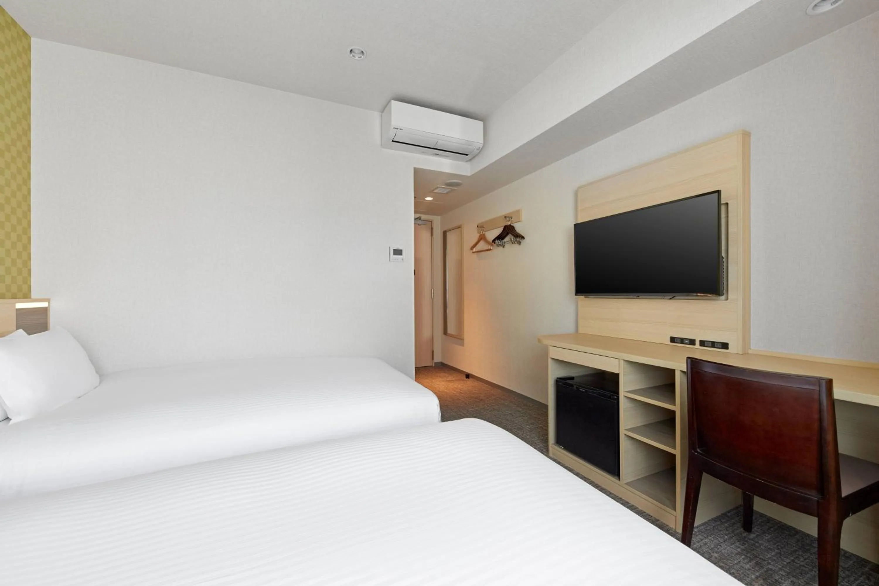 Bed in Sotetsu Fresa Inn Osaka Namba