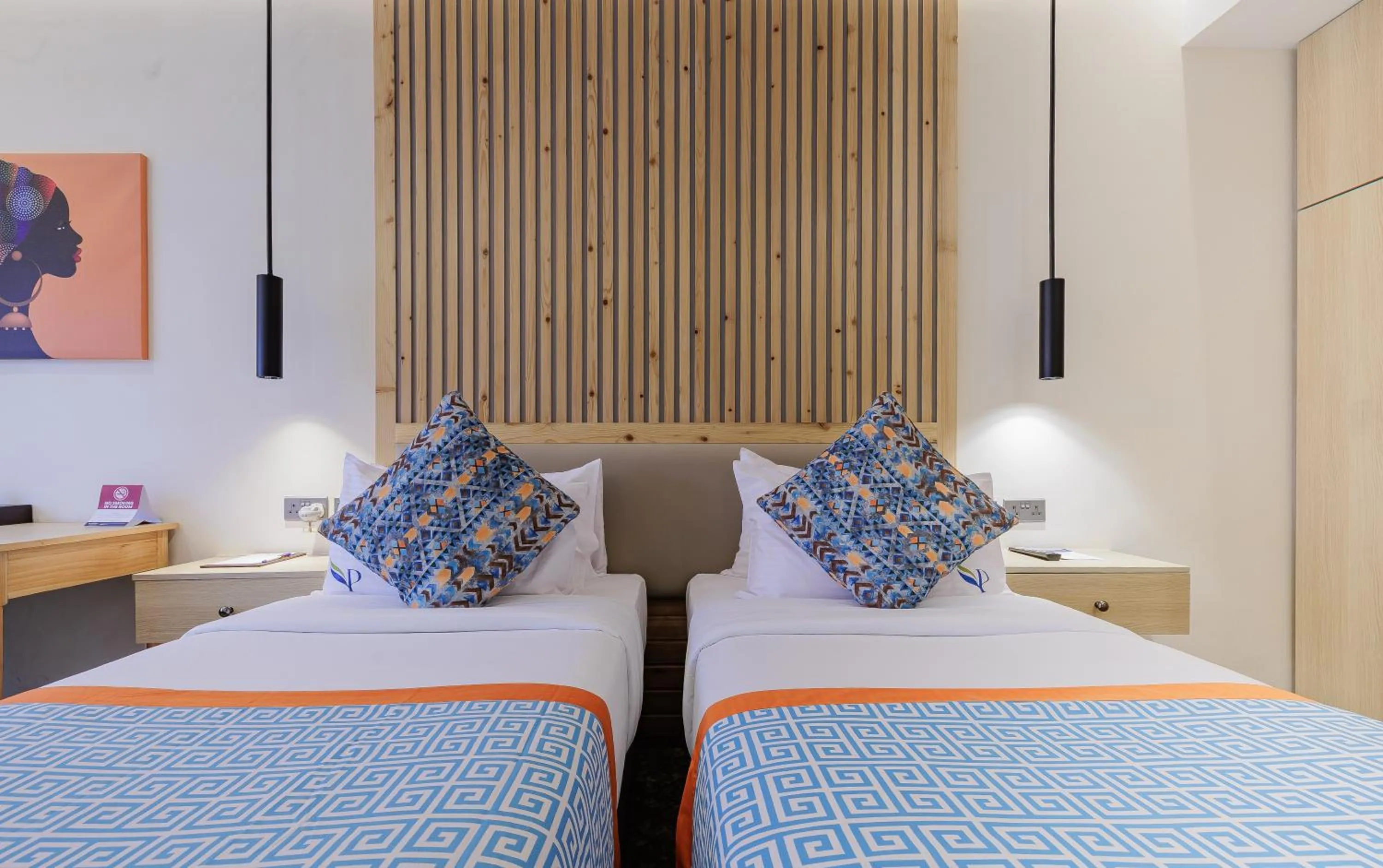 Bed in PrideInn Westlands Luxury Boutique Hotel