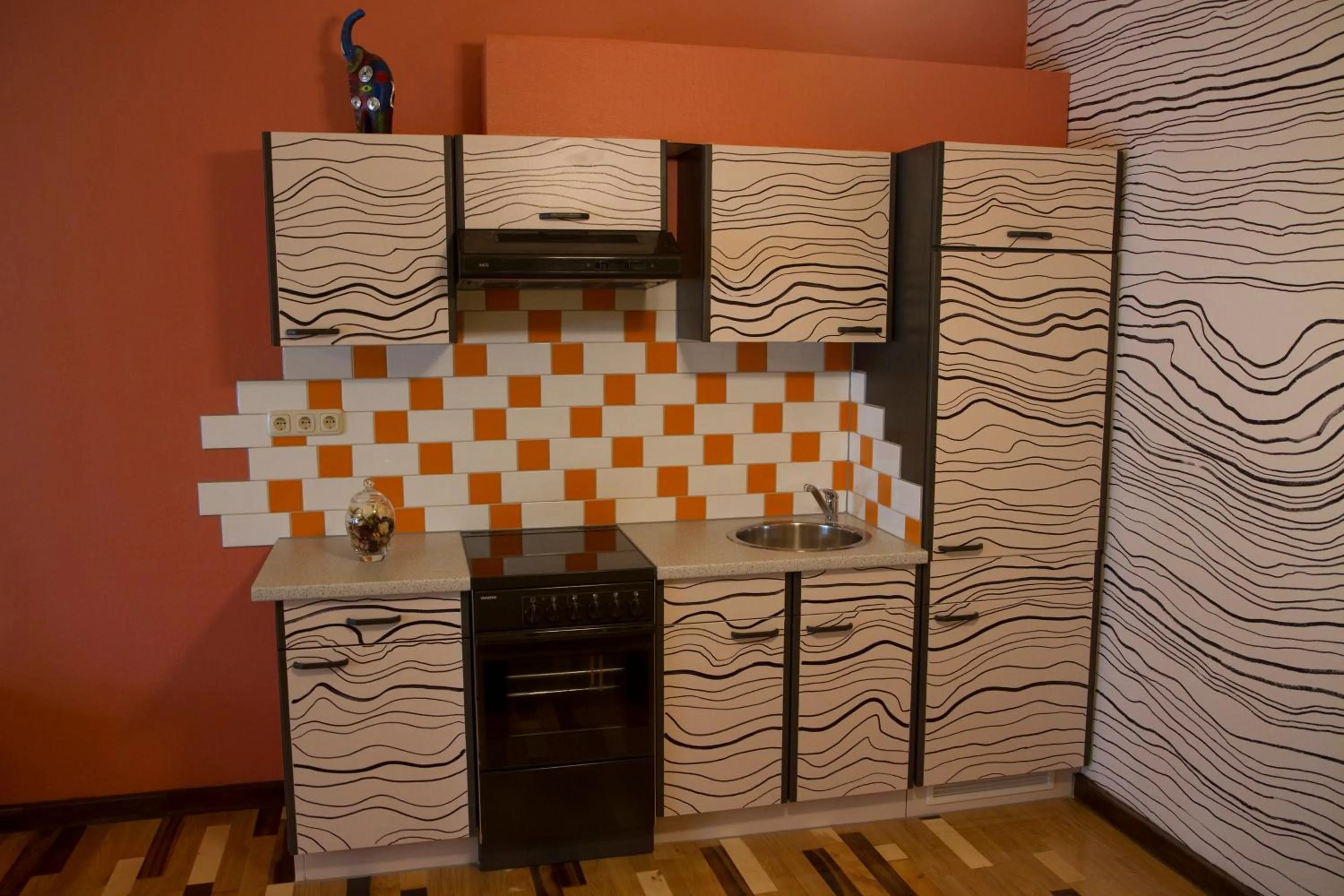 Kitchen or kitchenette in Art Apartments