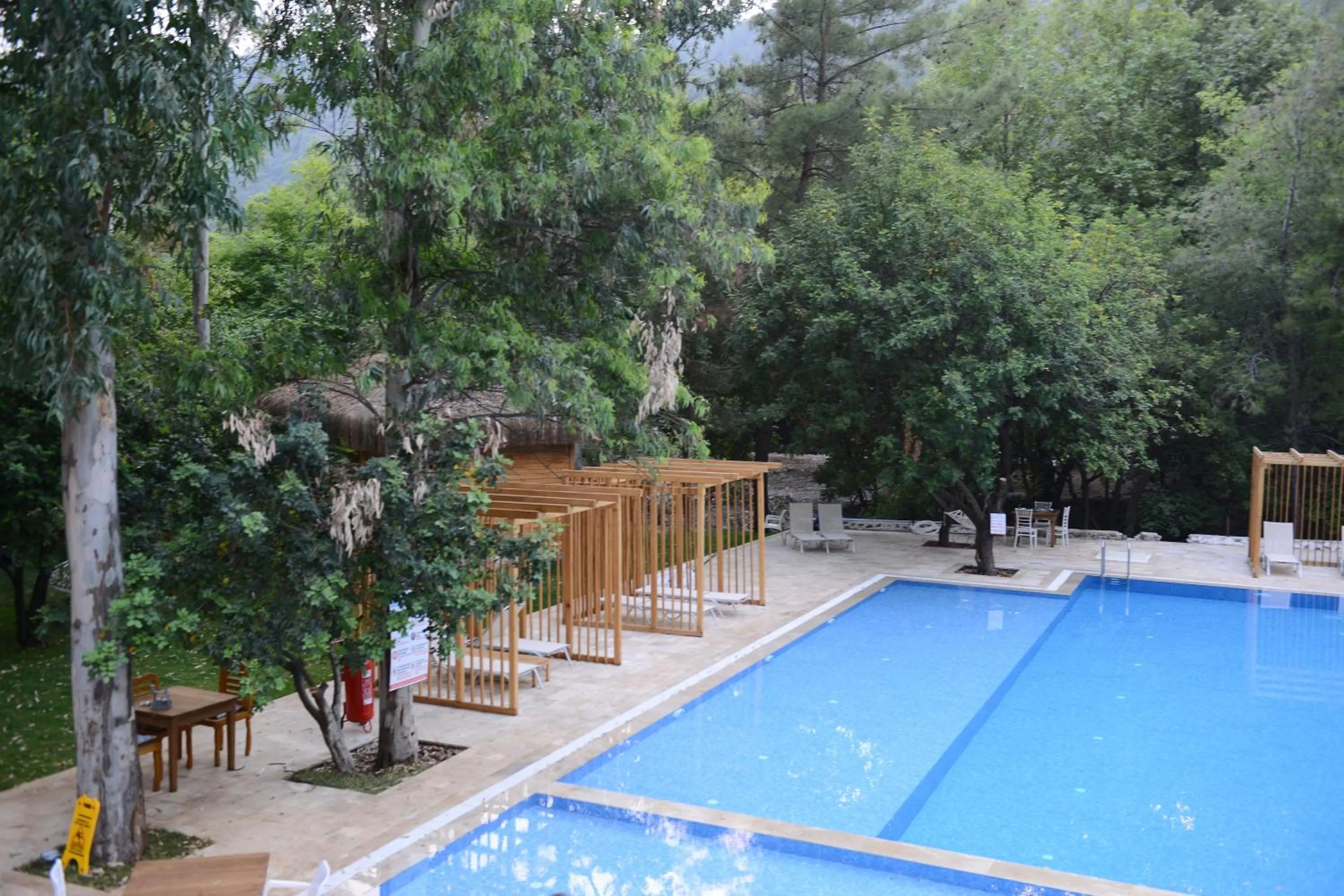 Swimming pool in Suna Village Hotel & Bungalow Fethiye