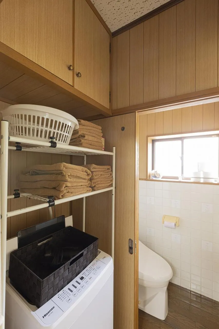 washing machine in Guest House Shine Bright