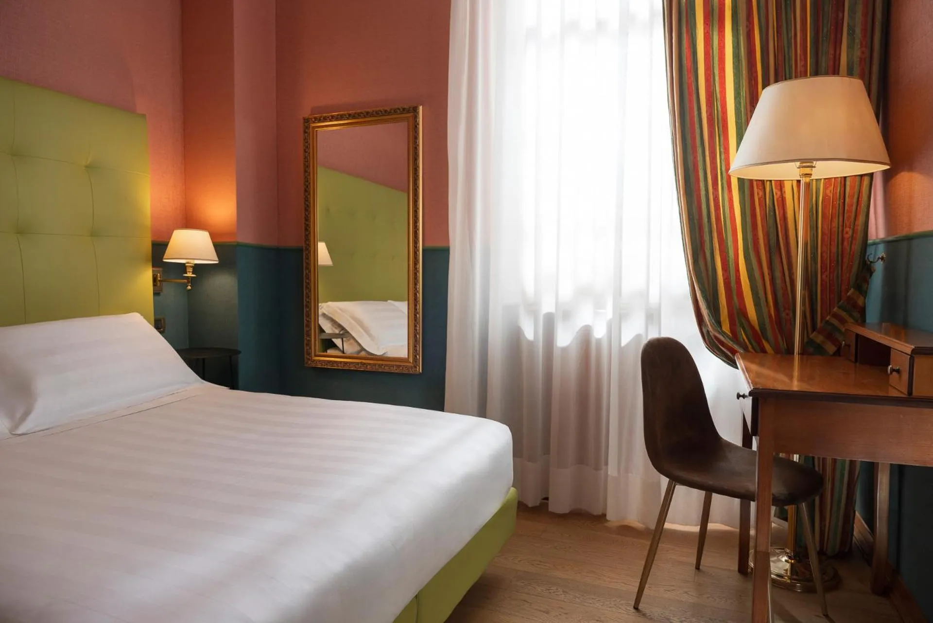 Bed in Hotel Oceania