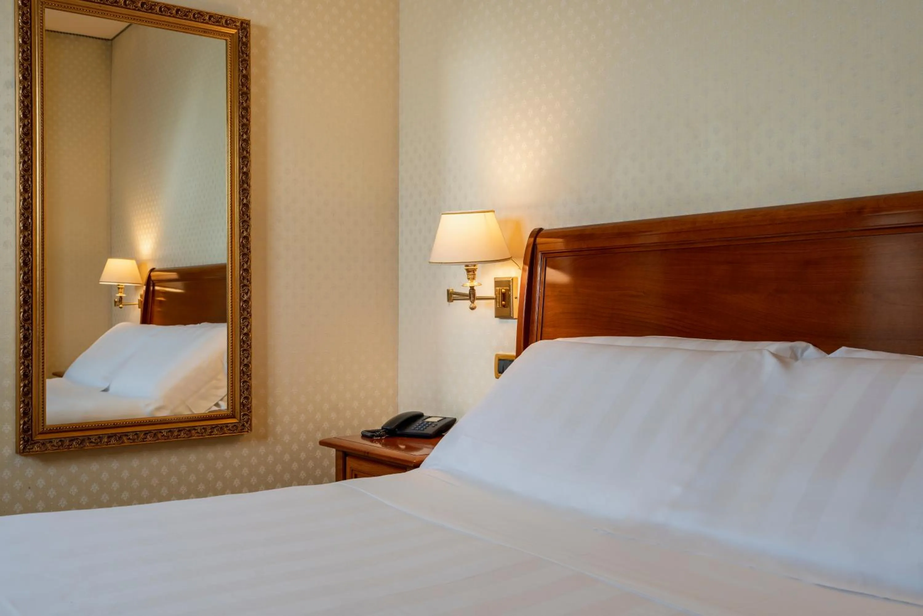 Bed in Hotel Oceania