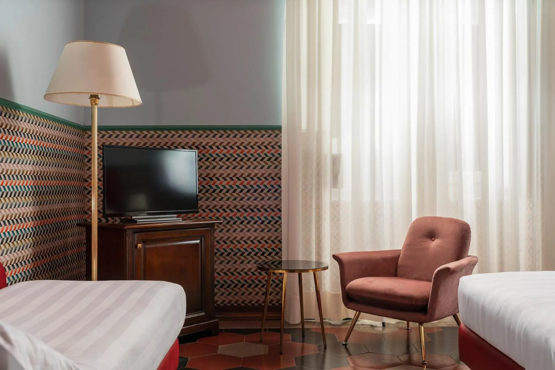 Bed in Hotel Oceania