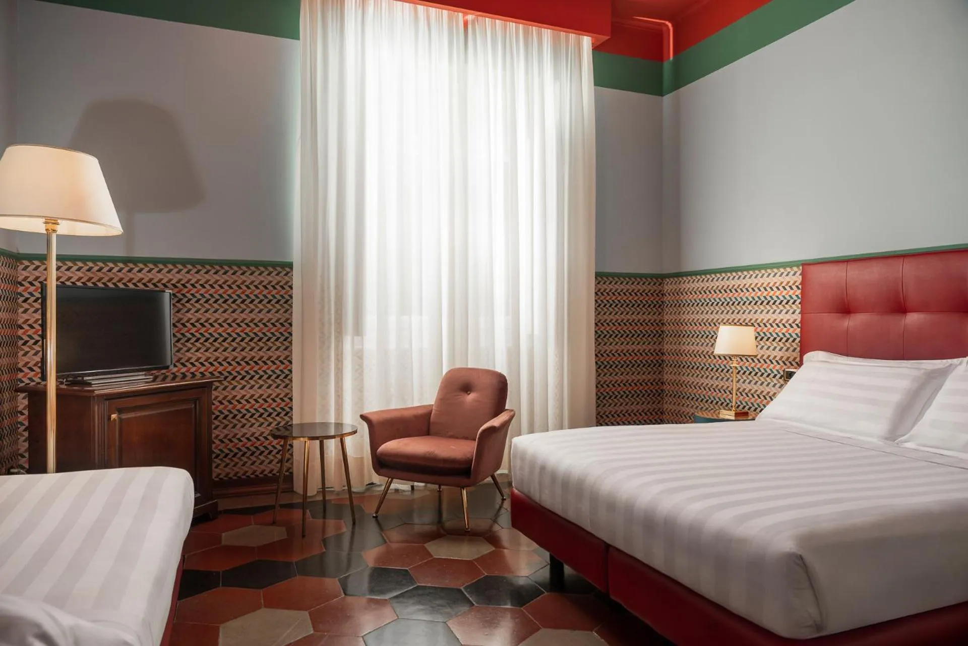 Bed in Hotel Oceania