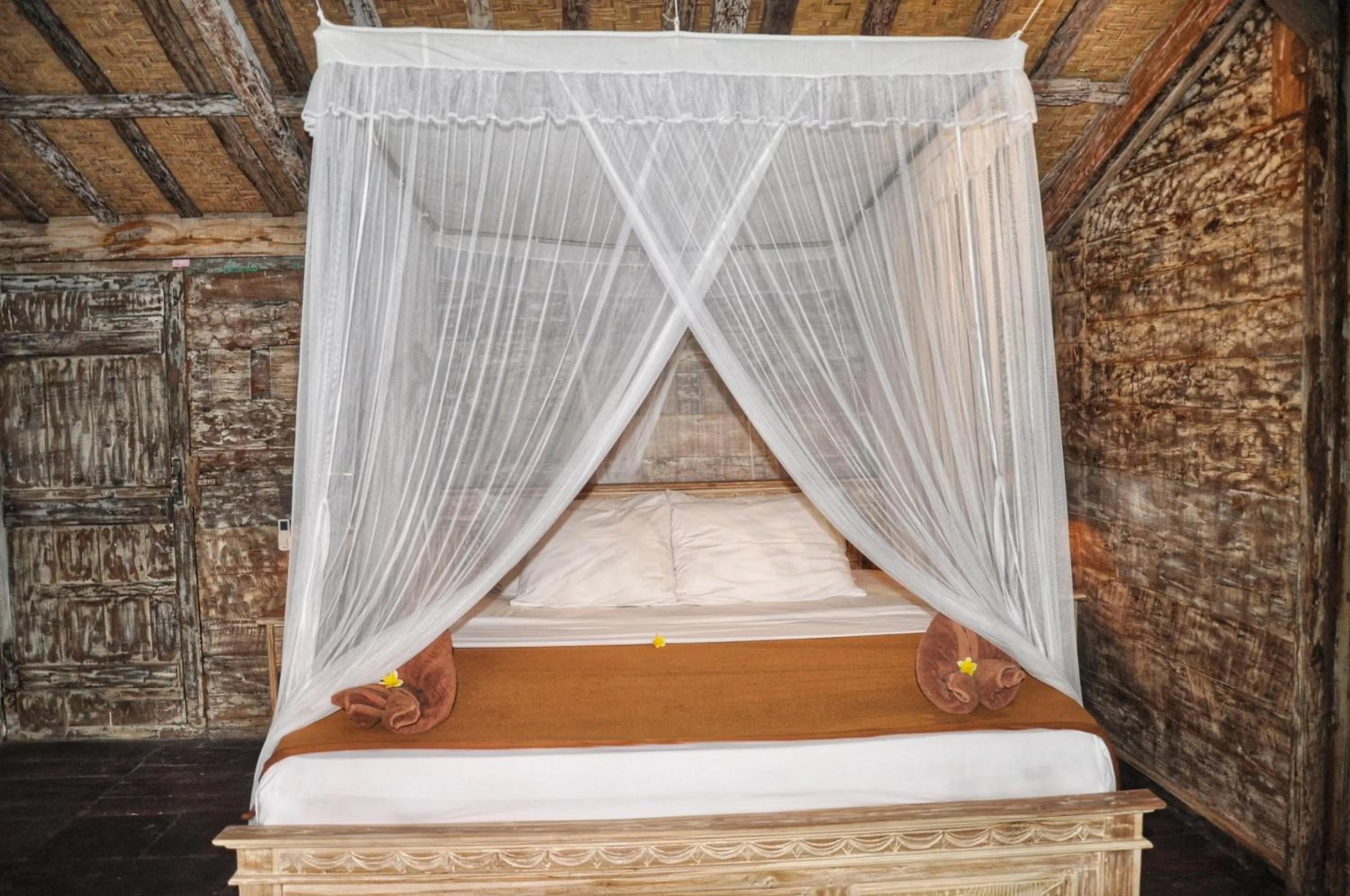 Bed in Kubudiuma Villas Bali