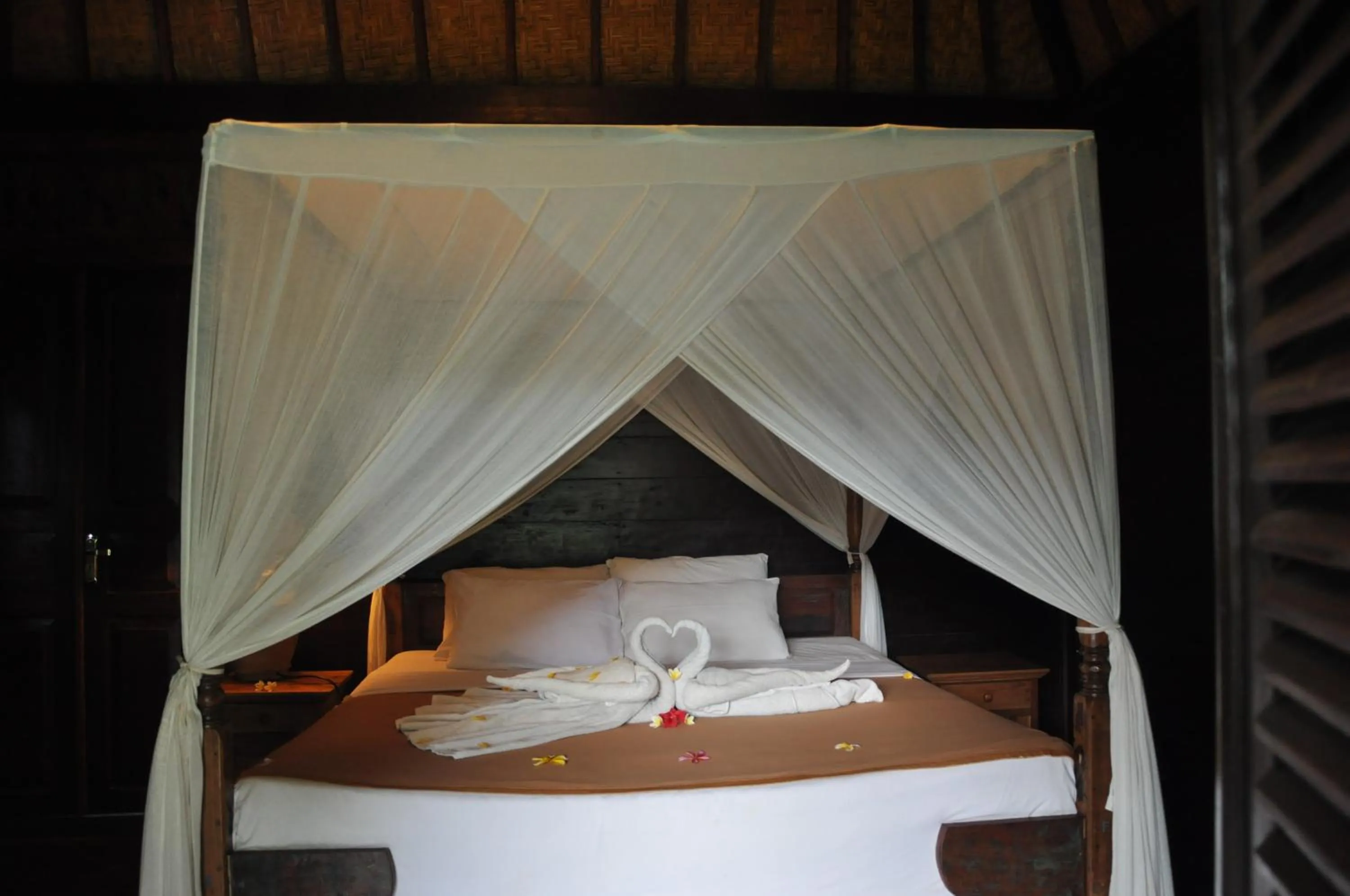 Bed in Kubudiuma Villas Bali