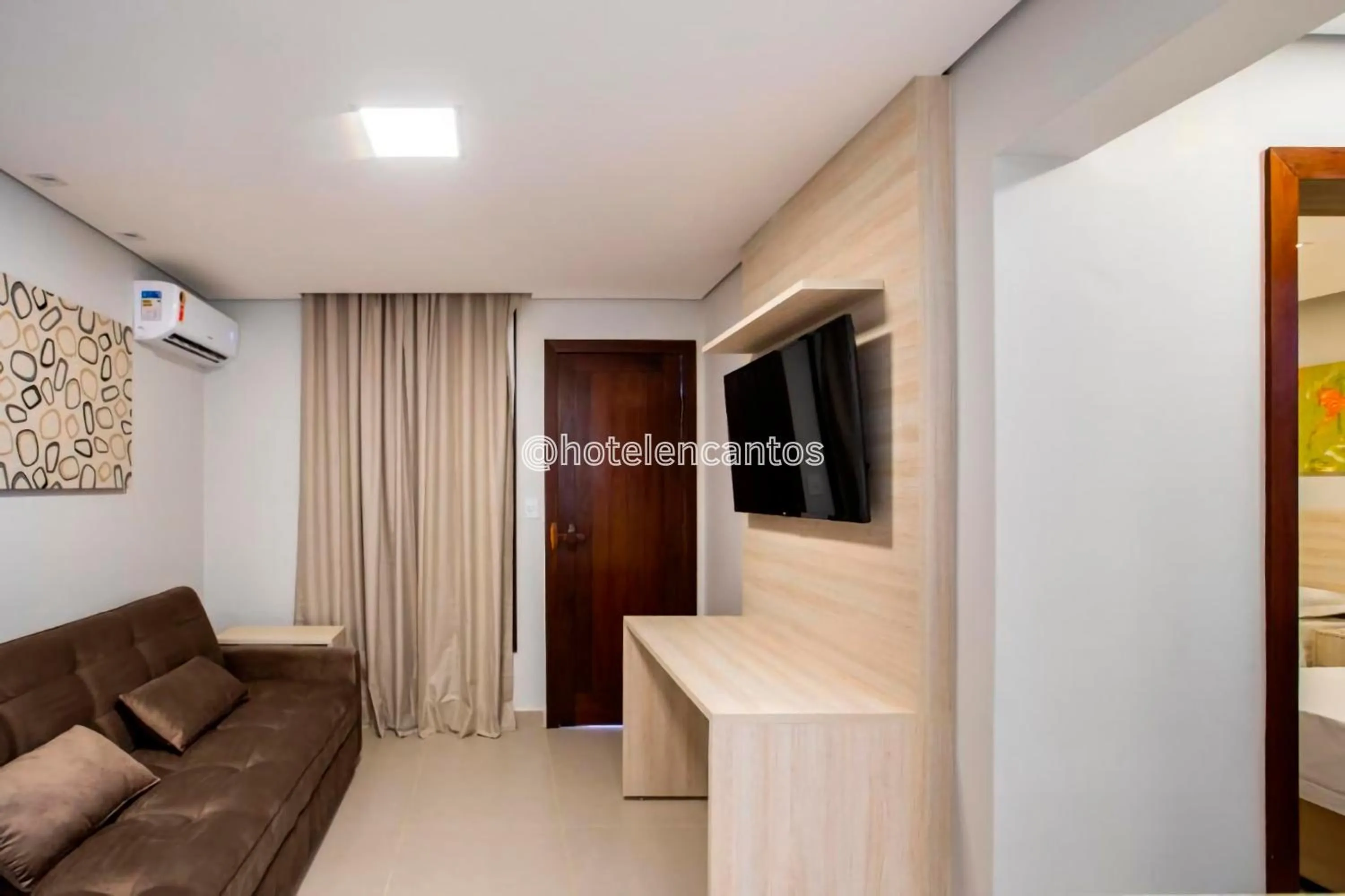 Living room in Hotel Encantos de Itaperapuã