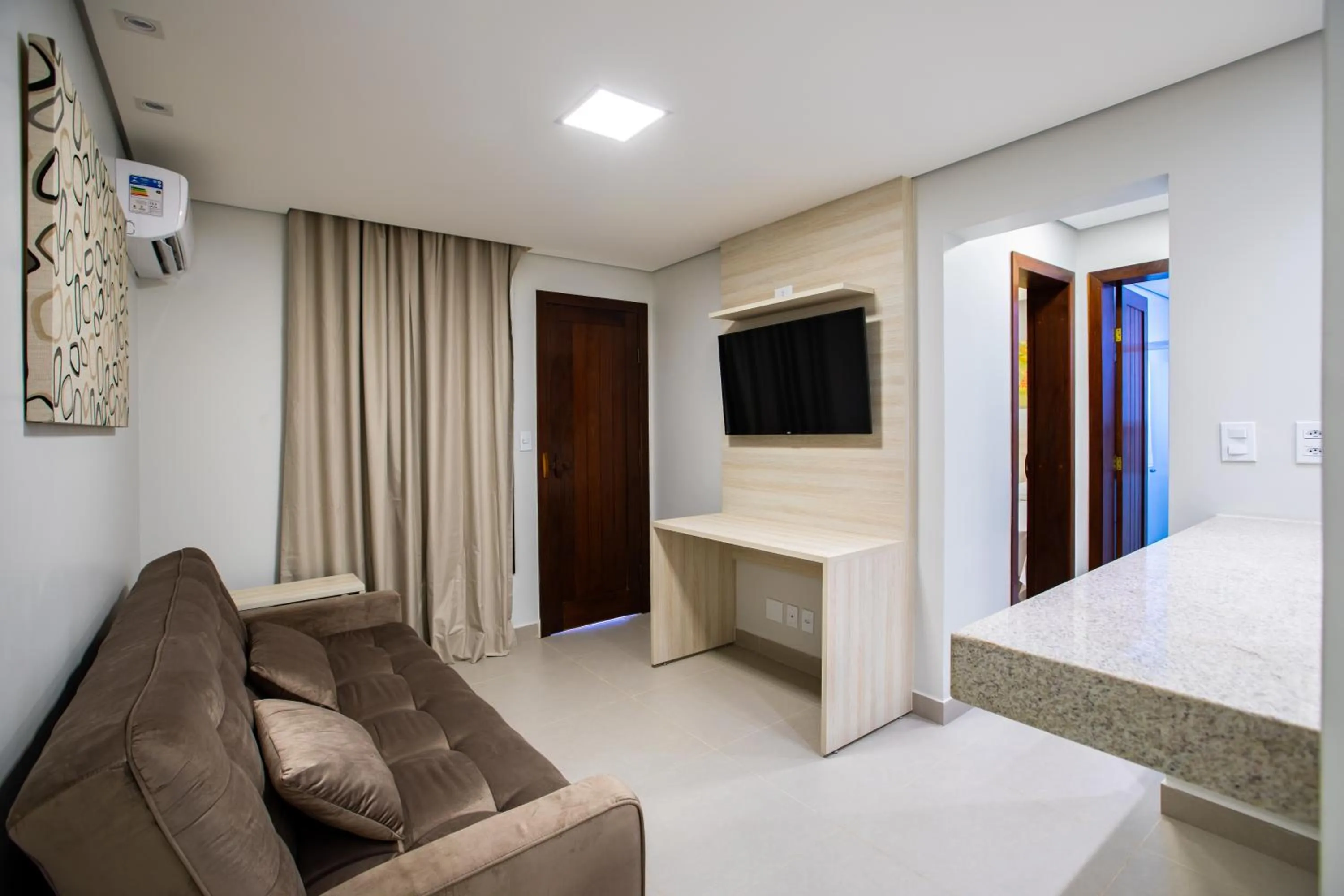 TV and multimedia in Hotel Encantos de Itaperapuã