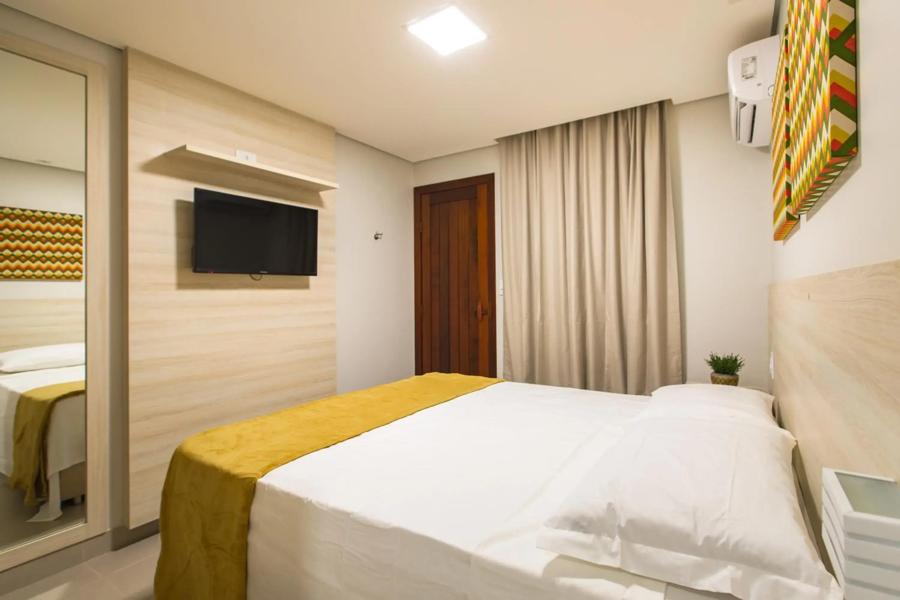 Luxury Triple Room in Hotel Encantos de Itaperapuã Luxury Triple Room in Hotel Encantos de Itaperapuã